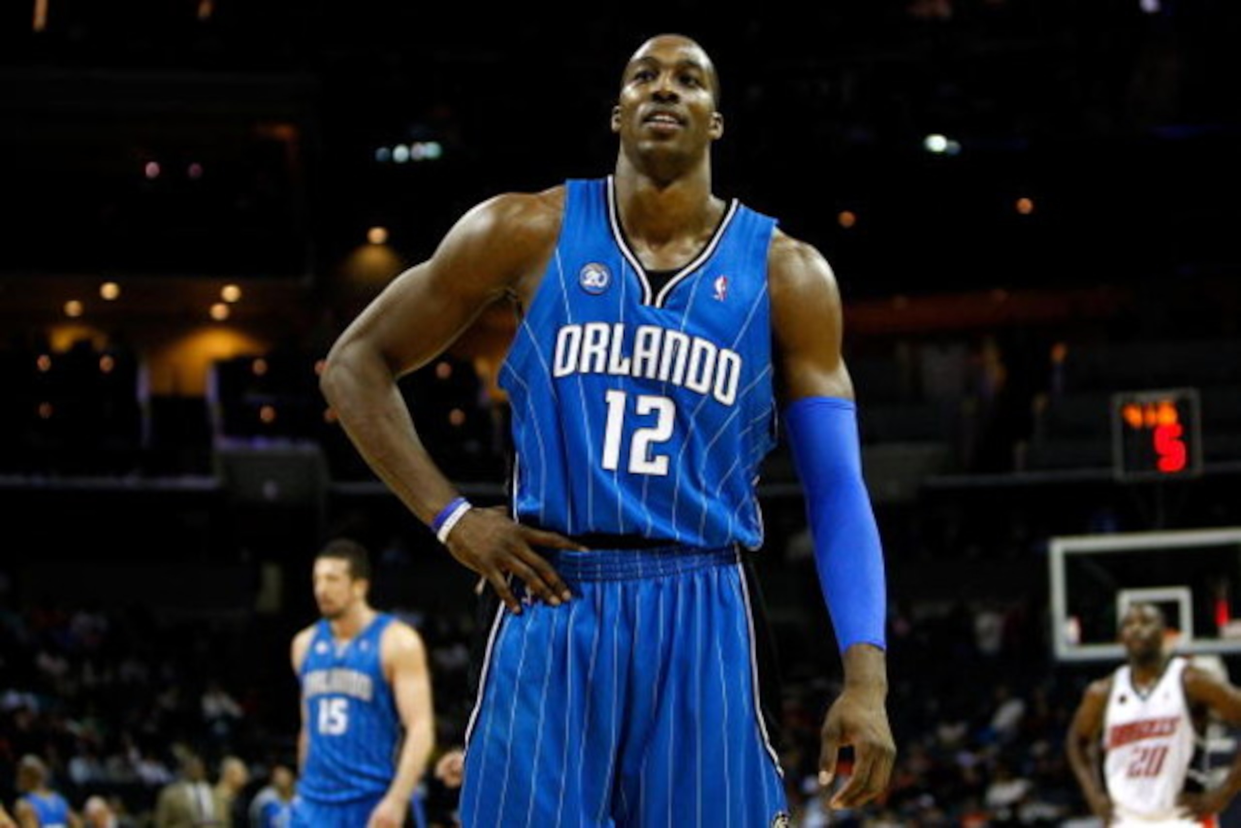CHARLOTTE, NC - FEBRUARY 20:  Dwight Howard #12 of the Orlando Magic looks to the crowd during their game against the Charlotte Bobcats at Time Warner Cable Arena on February 20, 2009 in Charlotte, North Carolina. NOTE TO USER: User expressly acknowledges