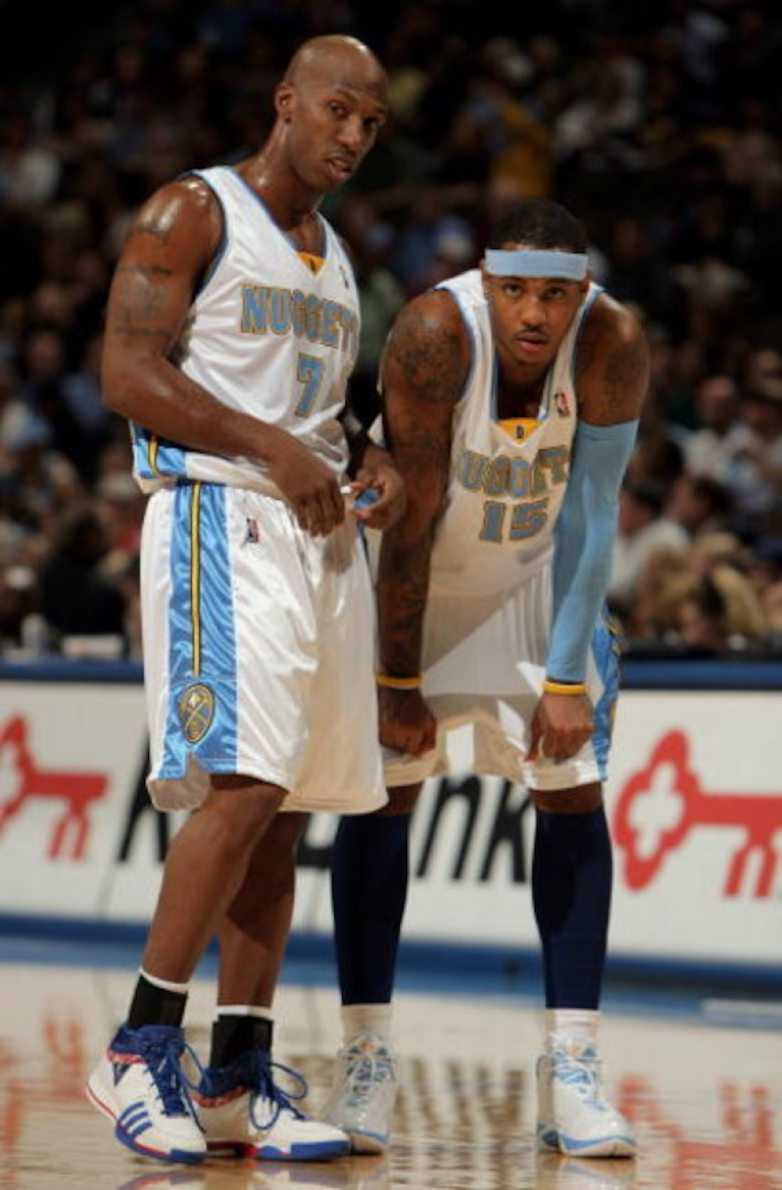 DENVER - NOVEMBER 18:  Chauncey Billups #7 and Carmelo Anthony #15 of the Denver Nuggets pause during NBA action against the Milwaukee Bucks at the Pepsi Center on November 18, 2008 in Denver, Colorado.  (Photo by Doug Pensinger/Getty Images)