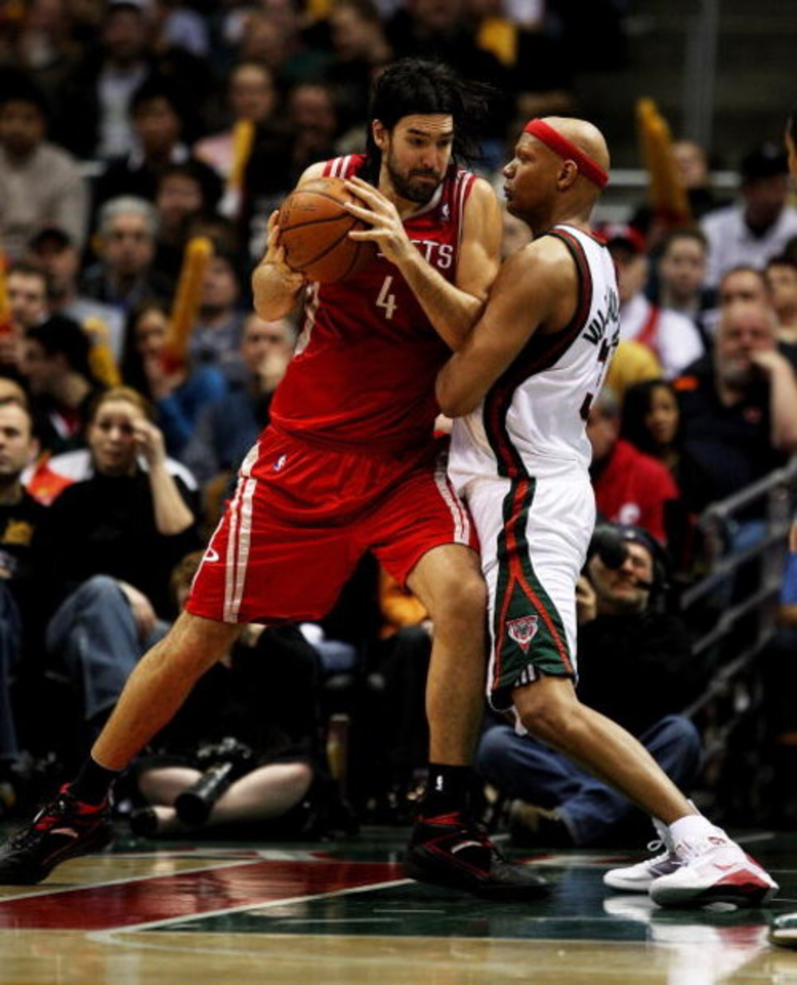 MILWAUKEE - FEBRUARY 09: Luis Scola #4 of the Houston Rockets moves against Charlie Villanueva #31 of the Milwaukee Bucks on February 9, 2009 at the Bradley Center in Milwaukee, Wisconsin. The Bucks defeated the Rockets 124-112. NOTE TO USER: User express