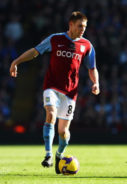 BIRMINGHAM, UNITED KINGDOM - FEBRUARY 21: James Milner of Aston Villa in action during the Barclays Premier League match between Aston Villa and Chelsea at Villa Park on February 21, 2009 in Birmingham, England.  (Photo by Clive Brunskill/Getty Images)
