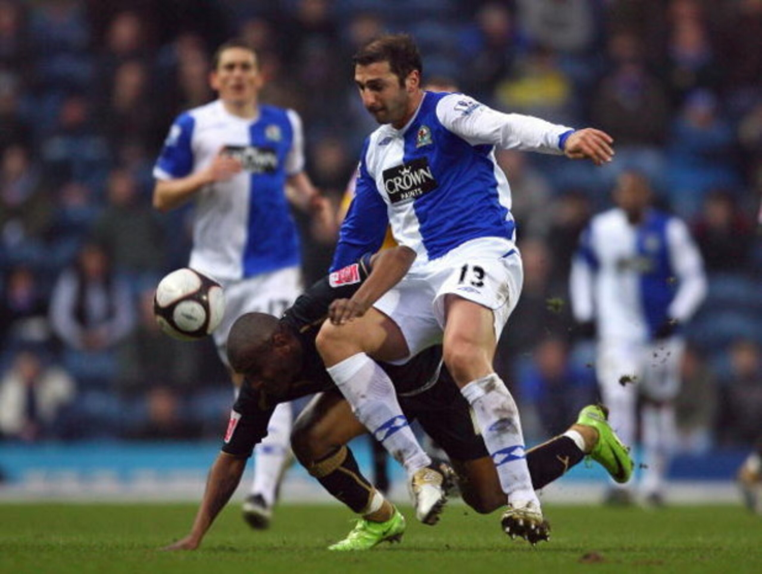 BLACKBURN, UNITED KINGDOM - FEBRUARY 14: Zurab Khizanishvili (R) of Blackburn Rovers tackles Clinton Morrison of Coventry City during the FA Cup 5th Round match sponsored by e.on between Blackburn Rovers and Coventry City at Ewood Park on February 14, 20 BLACKBURN, UNITED KINGDOM - FEBRUARY 14: Zurab Khizanishvili (R) of Blackburn Rovers tackles Clinton Morrison of Coventry City during the FA Cup 5th Round match sponsored by e.on between Blackburn Rovers and Coventry City at Ewood Park on February 14, 20