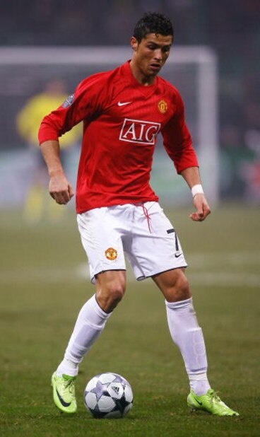 MILAN, ITALY - FEBRUARY 24:  Cristiano Ronaldo of Manchester United runs with the ball during the UEFA Champions League, Round of Last 16, First Leg match between Inter Milan and Manchester United at the San Siro Stadium on February 24, 2009 in Milan, Ita