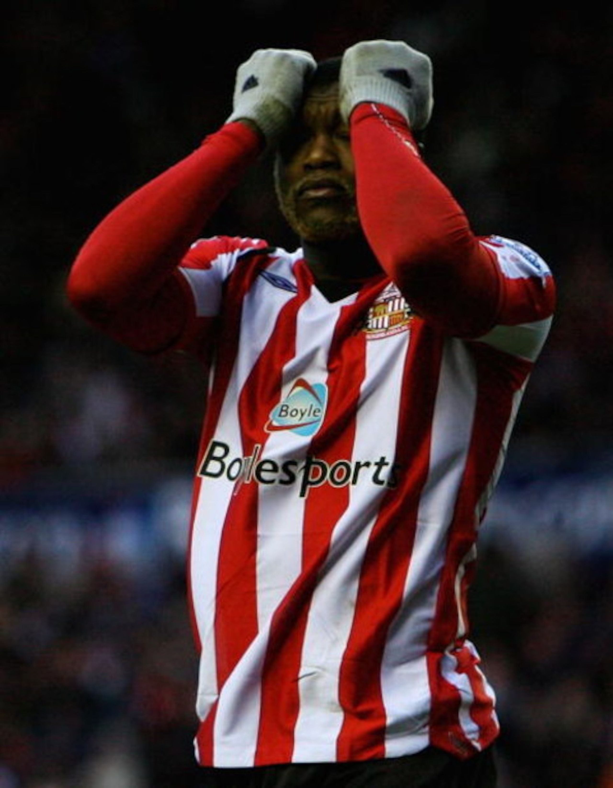 SUNDERLAND, UNITED KINGDOM - FEBRUARY 07: Djibril Cisse of Sunderland looks on during the Barclays Premier League match between Sunderland and Stoke City at the Stadium of Light on February 7, 2009 in Sunderland, England. (Photo by Matthew Lewis/Getty I SUNDERLAND, UNITED KINGDOM - FEBRUARY 07: Djibril Cisse of Sunderland looks on during the Barclays Premier League match between Sunderland and Stoke City at the Stadium of Light on February 7, 2009 in Sunderland, England. (Photo by Matthew Lewis/Getty I