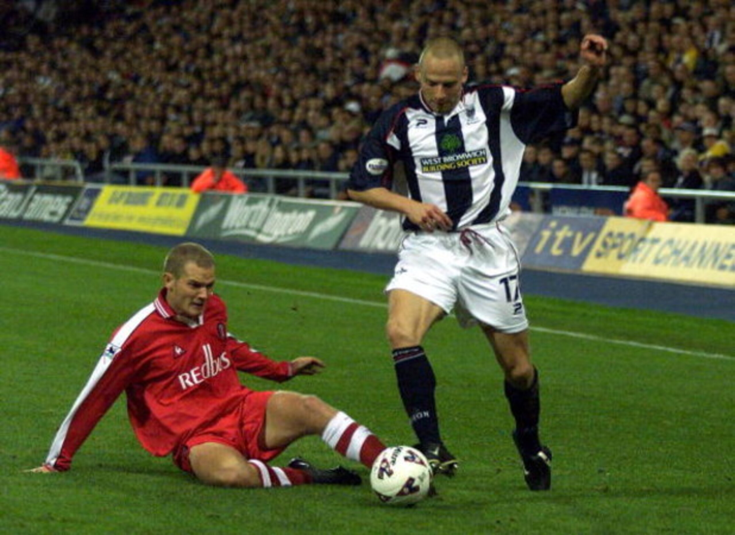 9 Oct 2001: Larus Sigurdsson of West Brom is challenged by Jonaton Johansson of Charlton during the Worthington Cup, Third Round game between West Bromwich Albion and Charlton Athletic at The Hawthorns, West Bromwich. DIGITAL IMAGE. Mandatory Credit:Mi 9 Oct 2001: Larus Sigurdsson of West Brom is challenged by Jonaton Johansson of Charlton during the Worthington Cup, Third Round game between West Bromwich Albion and Charlton Athletic at The Hawthorns, West Bromwich. DIGITAL IMAGE. Mandatory Credit:Mi