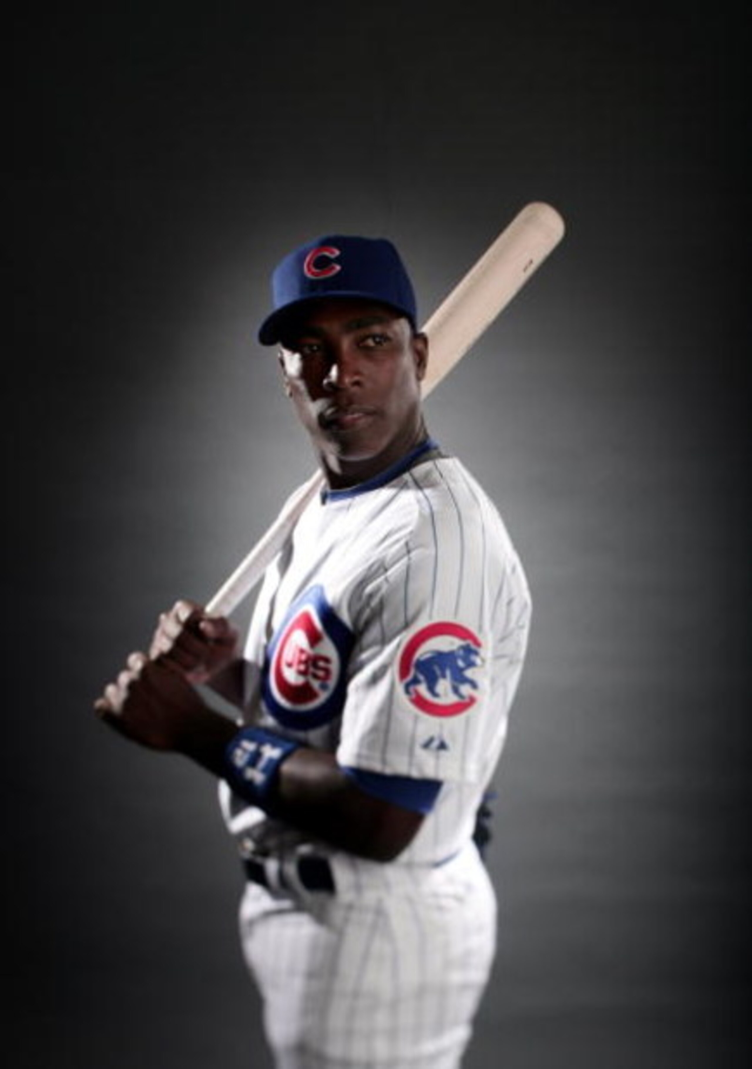 MESA, AZ - FEBRUARY 23:  (EDITORS NOTE: A TILT-SHIFT LENS WAS USED TO MAKE THIS IMAGE) Alfonso Soriano #12 of the Chicago Cubs poses during photo day at the Fitch Park Spring Training complex on February 23, 2009 in Mesa, Arizona. (Photo by Donald Miralle