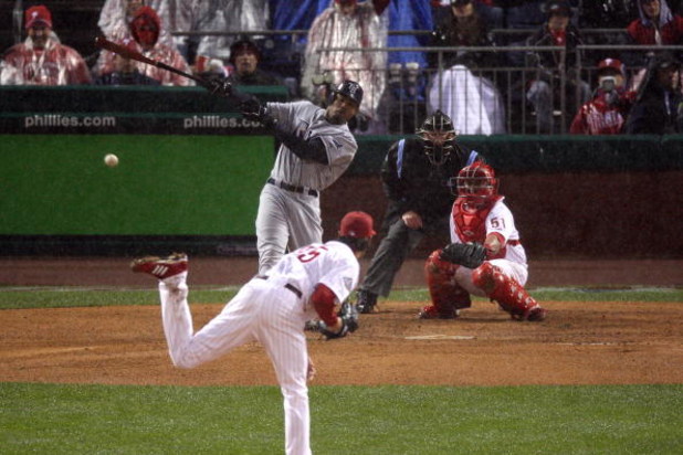 PHILADELPHIA - OCTOBER 27: Carl Crawford #13 of the Tampa Bay Rays bats against the Philadelphia Phillies during game five of the 2008 MLB World Series on October 27, 2008 at Citizens Bank Park in Philadelphia, Pennsylvania.  (Photo by Jeff Zelevansky/Get