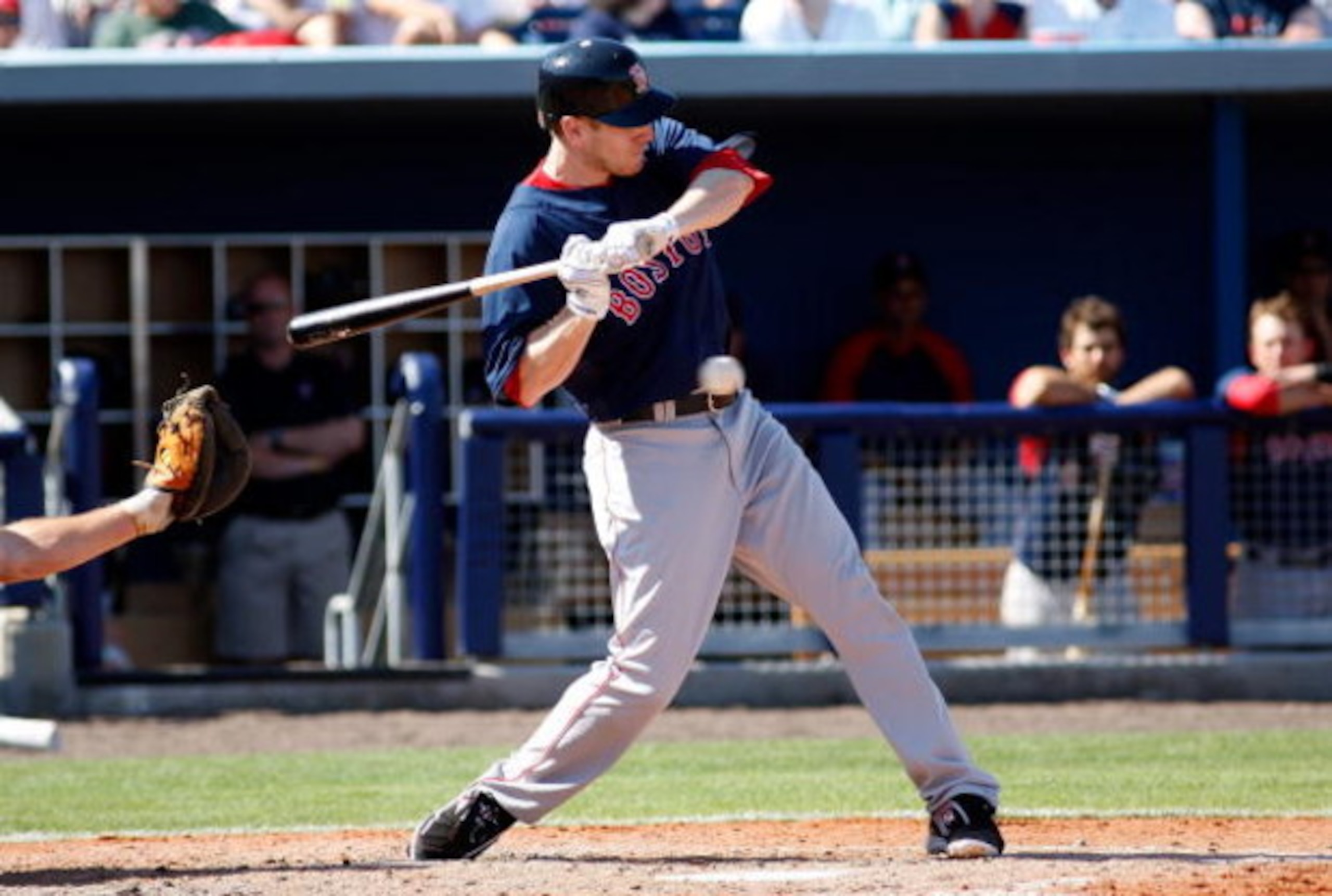 PORT CHARLOTTE, FL - FEBRUARY 27:  Outfielder Jason Bay #44 of the Boston Red Sox is hit by a pitch against the Tampa Bay Rays during a Grapefruit League Spring Training Game at Charlotte Sports Park on February 27, 2009 in Port Charlotte, Florida.  (Phot