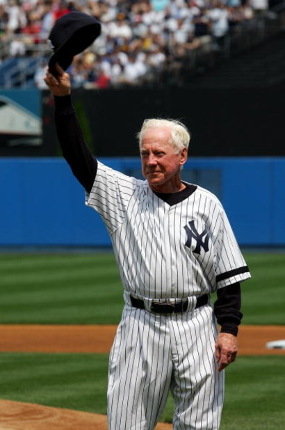 NEW YORK - JULY 07:  Former New York Yankee Whitey Ford salutes the crowd during Old Timers Day ceremonies before the Yankees play the Los Angeles Angels of Anaheim at Yankee Stadium on July 7, 2007 in the Bronx borough of New York City.  (Photo by Jim Mc