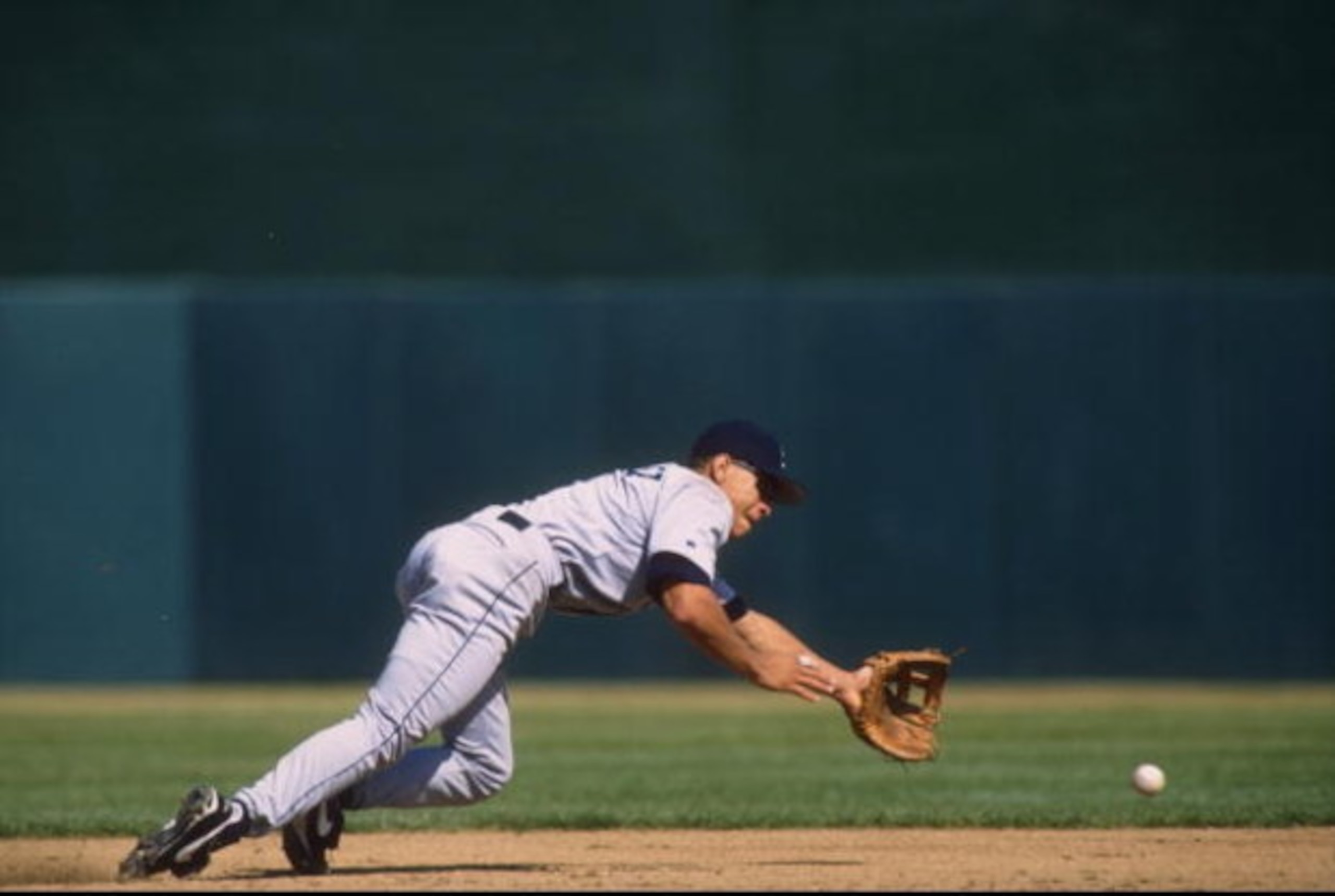 26 Sep 1996:  Infielder Alex Rodriguez of the Seattle Mariners dives for a ground ball during the Mariners 7-5 loss to the Oakland A's at Oakland Coliseum in Oalkand, California. Mandatory Credit: Otto Greule Jr.  /Allsport