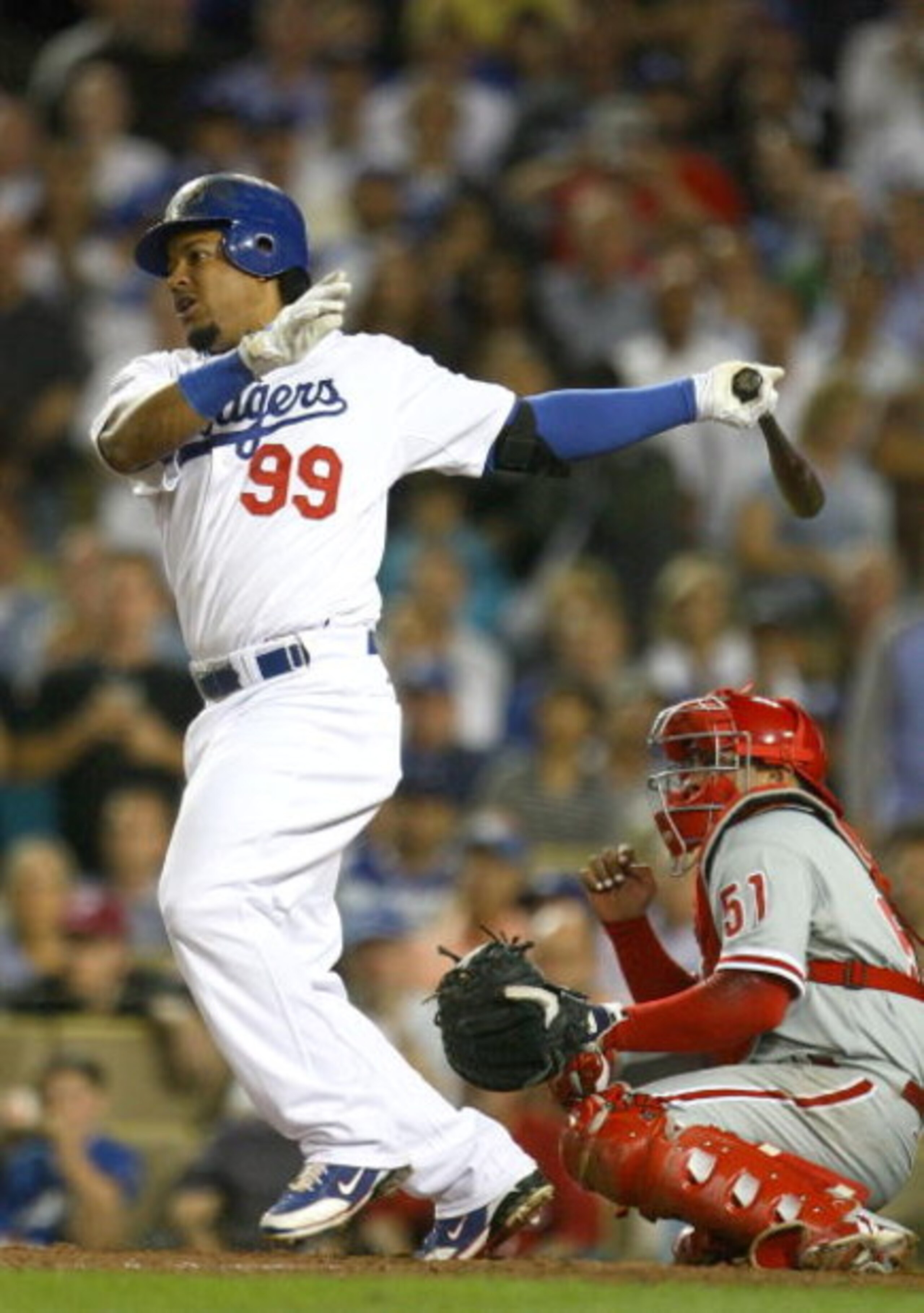 LOS ANGELES, CA - OCTOBER 15:  Manny Ramirez #99 of the Los Angeles Dodgers swings at a pitch in the eighth inning against the Philadelphia Phillies in Game Five of the National League Championship Series during the 2008 MLB playoffs on October 15, 2008 a