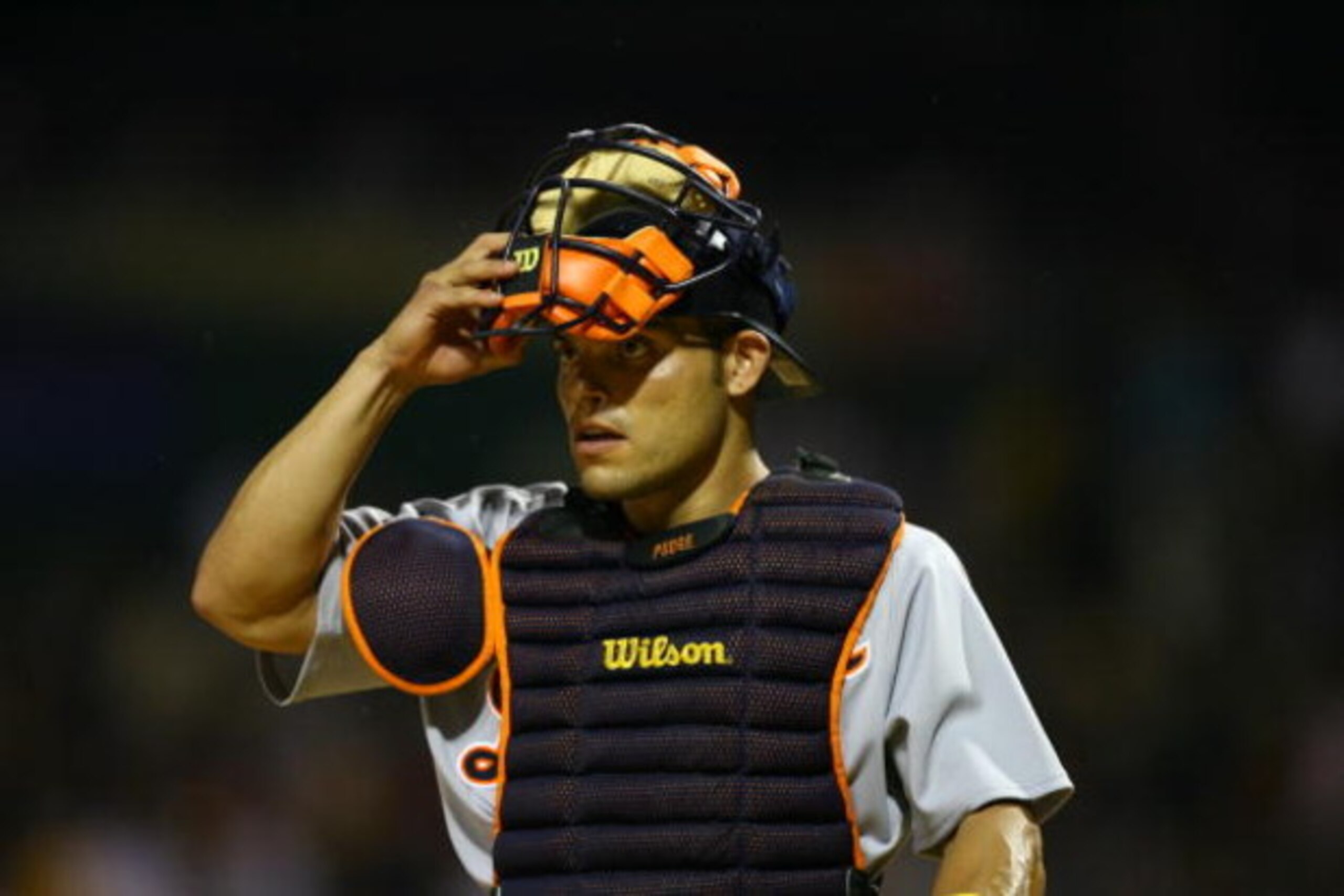 PITTSBURGH - JULY 11:  Catcher Ivan Rodriguez #7 of the American League All-Star team removes his face guard during the 77th MLB All-Star Game against the National League All-Star team at PNC Park on July 11, 2006 in Pittsburgh, Pennsylvania. The American