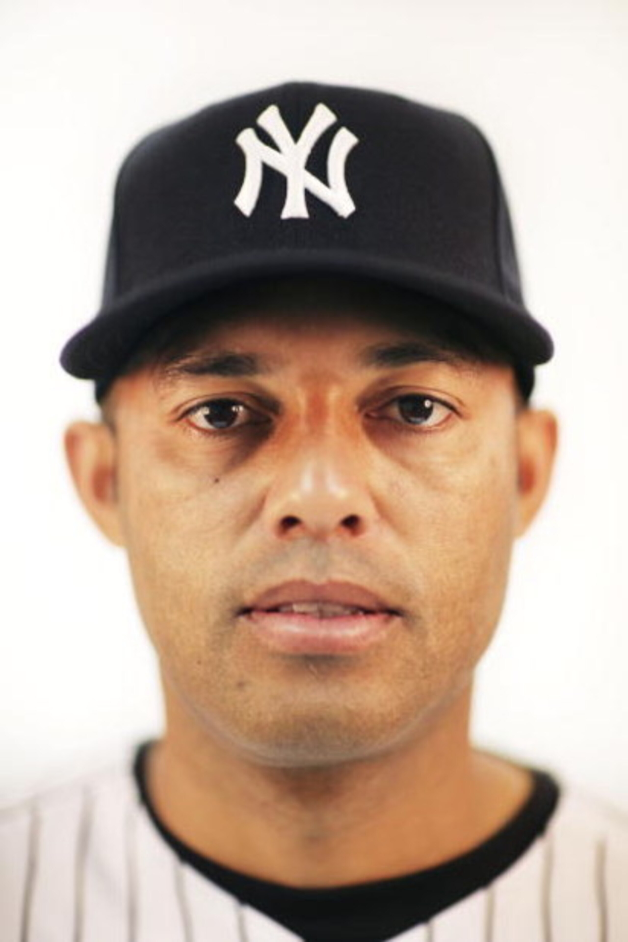 TAMPA, FL - FEBRUARY 19:  (EDITOR'S NOTE: IMAGES HAVE BEEN DIGITALLY DESATURATED) Mariano Rivera #42 of the New York Yankees poses during Photo Day on February 19, 2009 at George M. Steinbrenner Field in Tampa, Florida.  (Photo by Nick Laham/Getty Images)