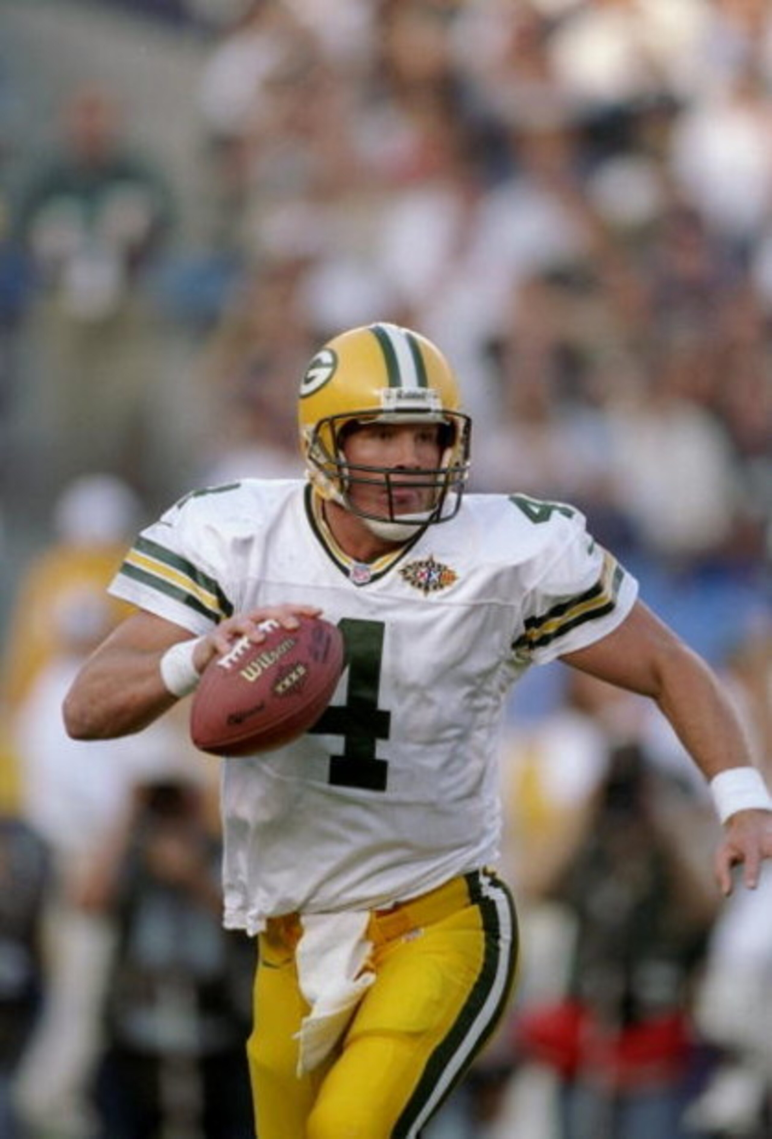 25 Jan 1998:  Quarterback Brett Favre #4 of the Green Bay Packers in action against the Denver Broncos during Super Bowl  XXXII at Qualcomm Stadium in San Diego, California.  The Denver Broncos defeated the Green Bay Packers 31-24. Mandatory Credit: Rick