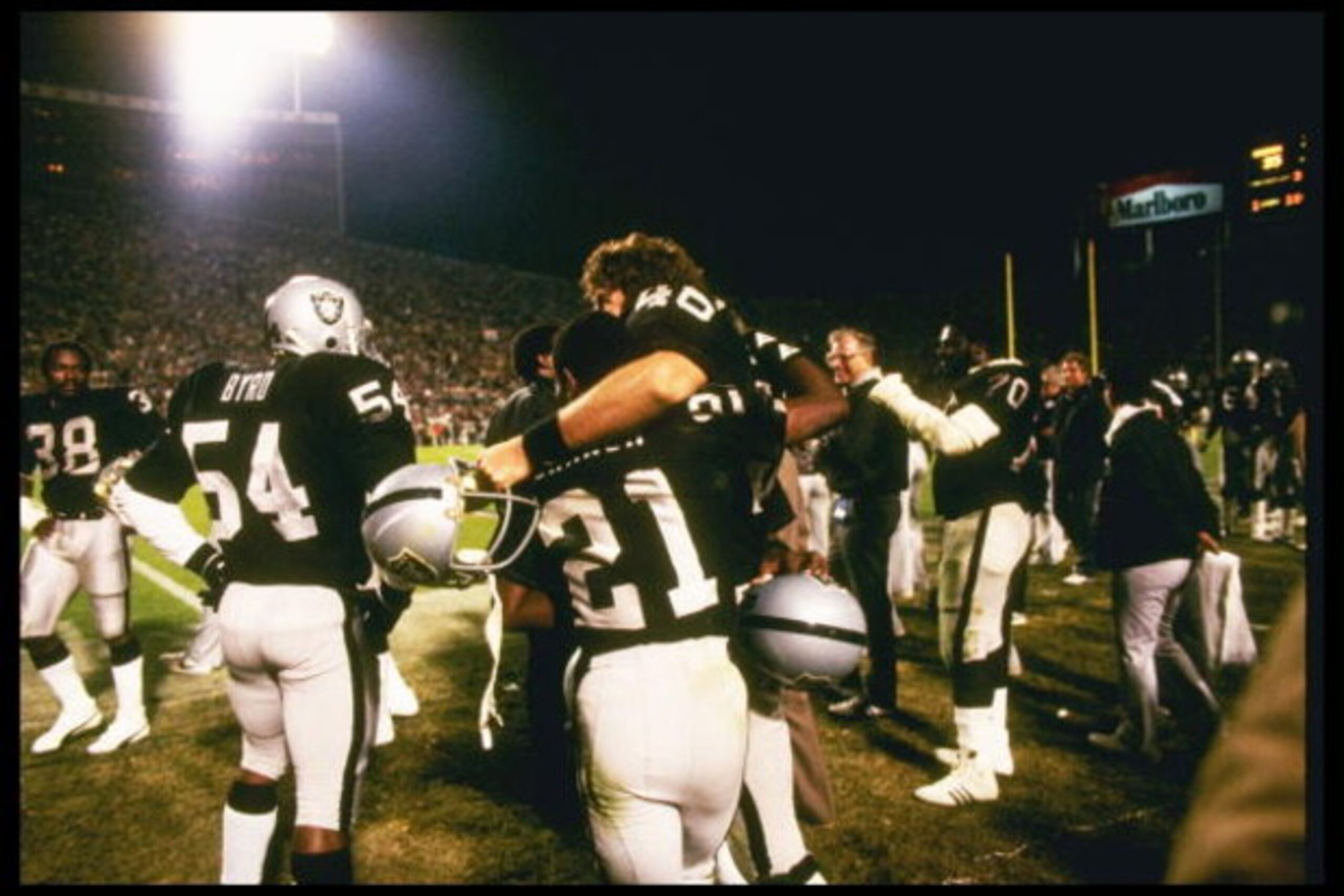 22 Jan 1984: The Los Angeles Raiders celebrate after Super Bowl XVIII against the Washington Redskins at Tampa Stadium in Tampa, Florida. The Raiders won the game, 38-9.
