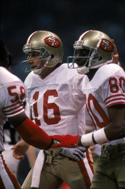 NEW ORLEANS - JANUARY 28: Quarterback Joe Montana #16 and wide receiver Jerry Rice #80 of the San Francisco 49ers celebrate in Super Bowl XXIV against the Denver Broncos at Louisiana Superdome on January 28, 1990 in New Orleans, Louisiana. The 49ers won NEW ORLEANS - JANUARY 28: Quarterback Joe Montana #16 and wide receiver Jerry Rice #80 of the San Francisco 49ers celebrate in Super Bowl XXIV against the Denver Broncos at Louisiana Superdome on January 28, 1990 in New Orleans, Louisiana. The 49ers won