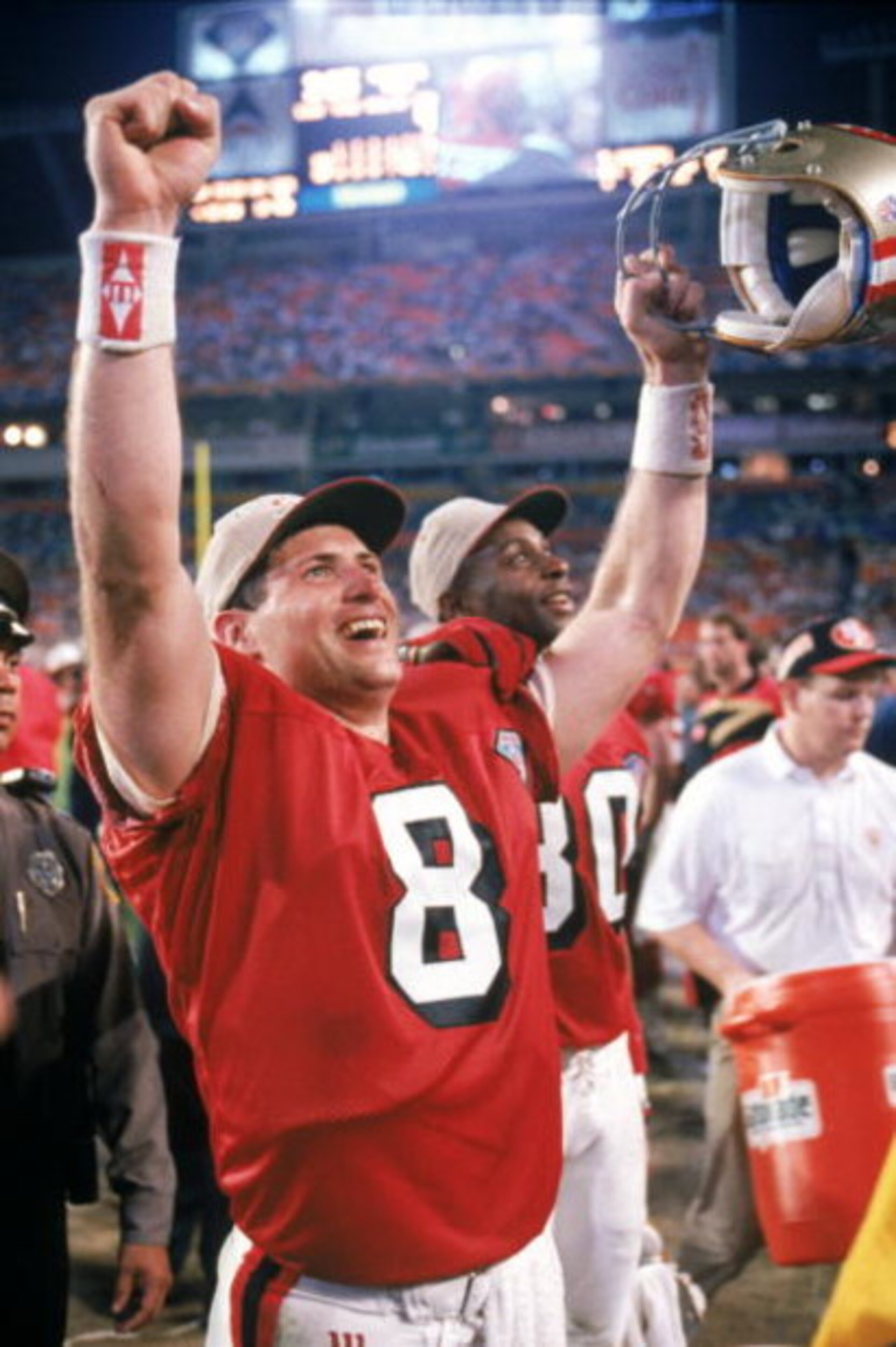 MIAMI - JANUARY 29:  Quarterback Steve Young #8 of the San Francisco 49ers celebrates following their Super Bowl XXIX against the San Diego Chargers at Joe Robbie Stadium on January 29, 1995 in Miami, Florida. The 49ers won 49-26. (Photo by George Rose/Ge