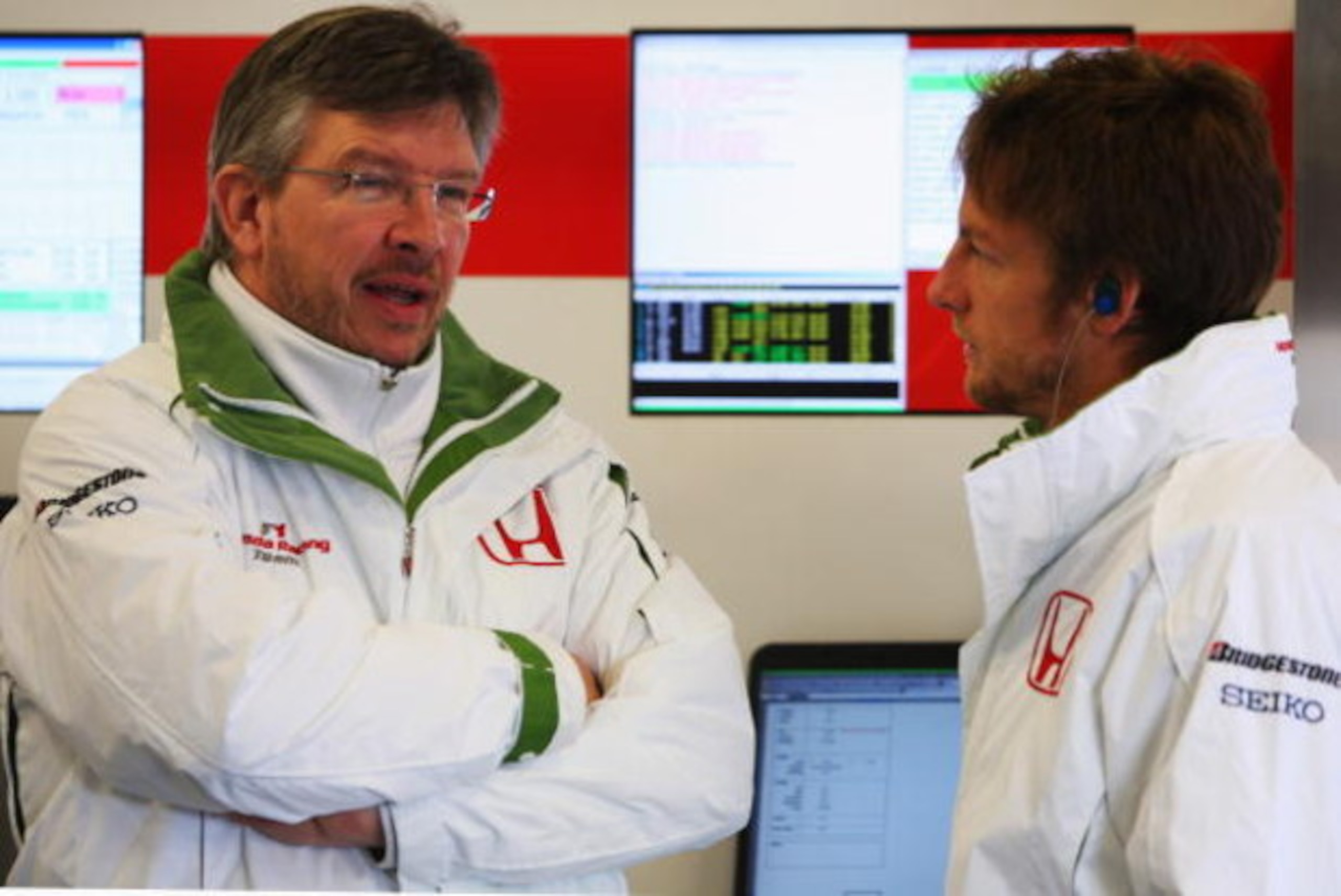 BARCELONA, SPAIN - NOVEMBER 19: Jenson Button of Great Britain and team Honda chats to technical director Ross Brawn during day three of Formula One Testing at the Circuit de Catalunya on November 19, 2008 in Barcelona, Spain. (Photo by Mark Thompson/G BARCELONA, SPAIN - NOVEMBER 19: Jenson Button of Great Britain and team Honda chats to technical director Ross Brawn during day three of Formula One Testing at the Circuit de Catalunya on November 19, 2008 in Barcelona, Spain. (Photo by Mark Thompson/G