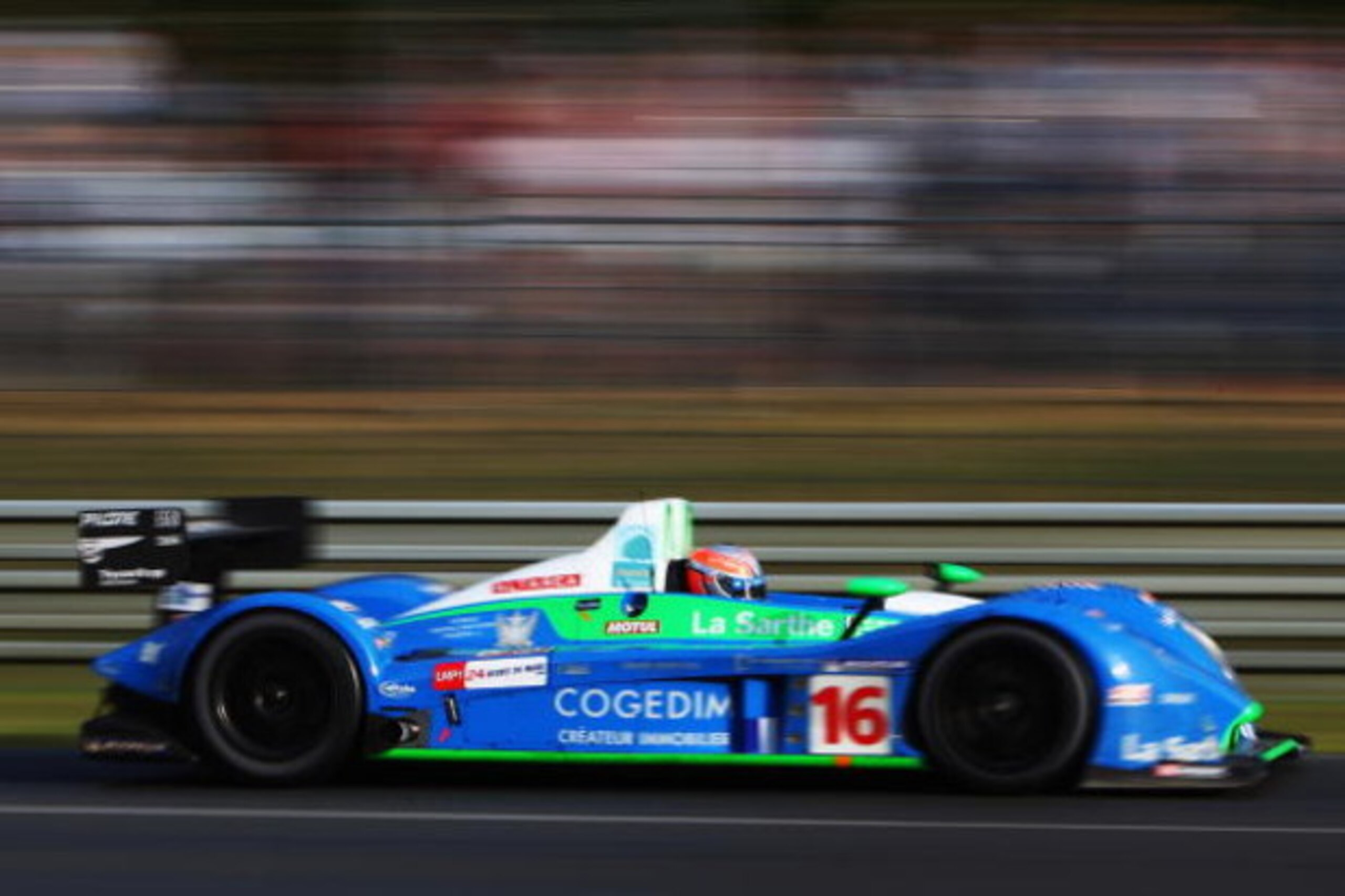 LE MANS, FRANCE - JUNE 14: The Pescarolo Sport car of Emmanuel Collard, Jean-Christophe Boullion and Romain Dumas of France drives during the 76th running of the Le Mans 24 Hour race at the Circuit des 24 Heures du Mans on June 14, 2008 in Le Mans, Franc LE MANS, FRANCE - JUNE 14: The Pescarolo Sport car of Emmanuel Collard, Jean-Christophe Boullion and Romain Dumas of France drives during the 76th running of the Le Mans 24 Hour race at the Circuit des 24 Heures du Mans on June 14, 2008 in Le Mans, Franc