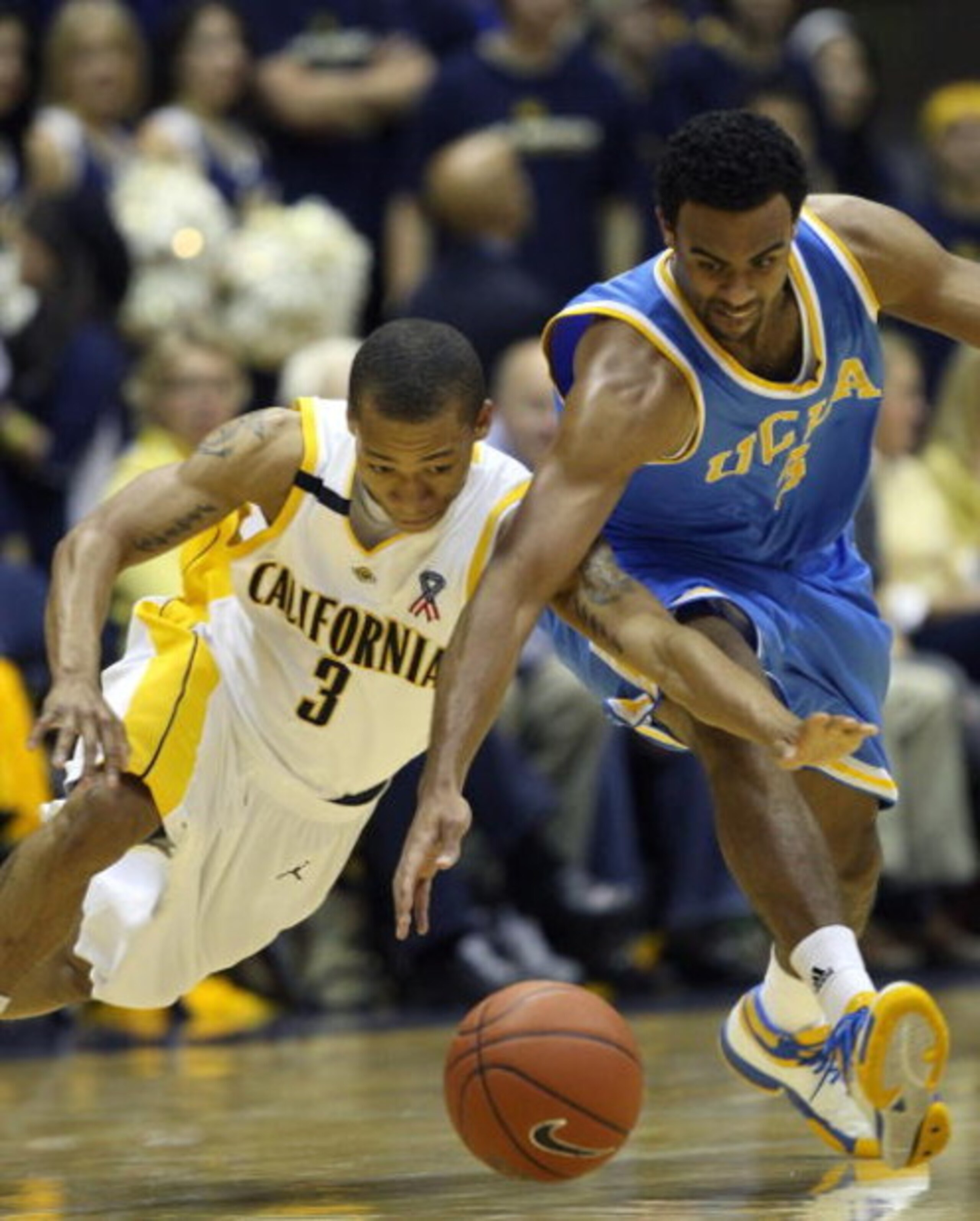 BERKELEY, CA - FEBRUARY 28: Josh Shipp #3 of the UCLA Bruins battles for the ball with Jerome Randle #3 of the California Golden Bears during an NCAA Pac-10 basketball game on February 28, 2009 at Haas Pavillion in Berkeley, California.  (Photo by Jed Jac