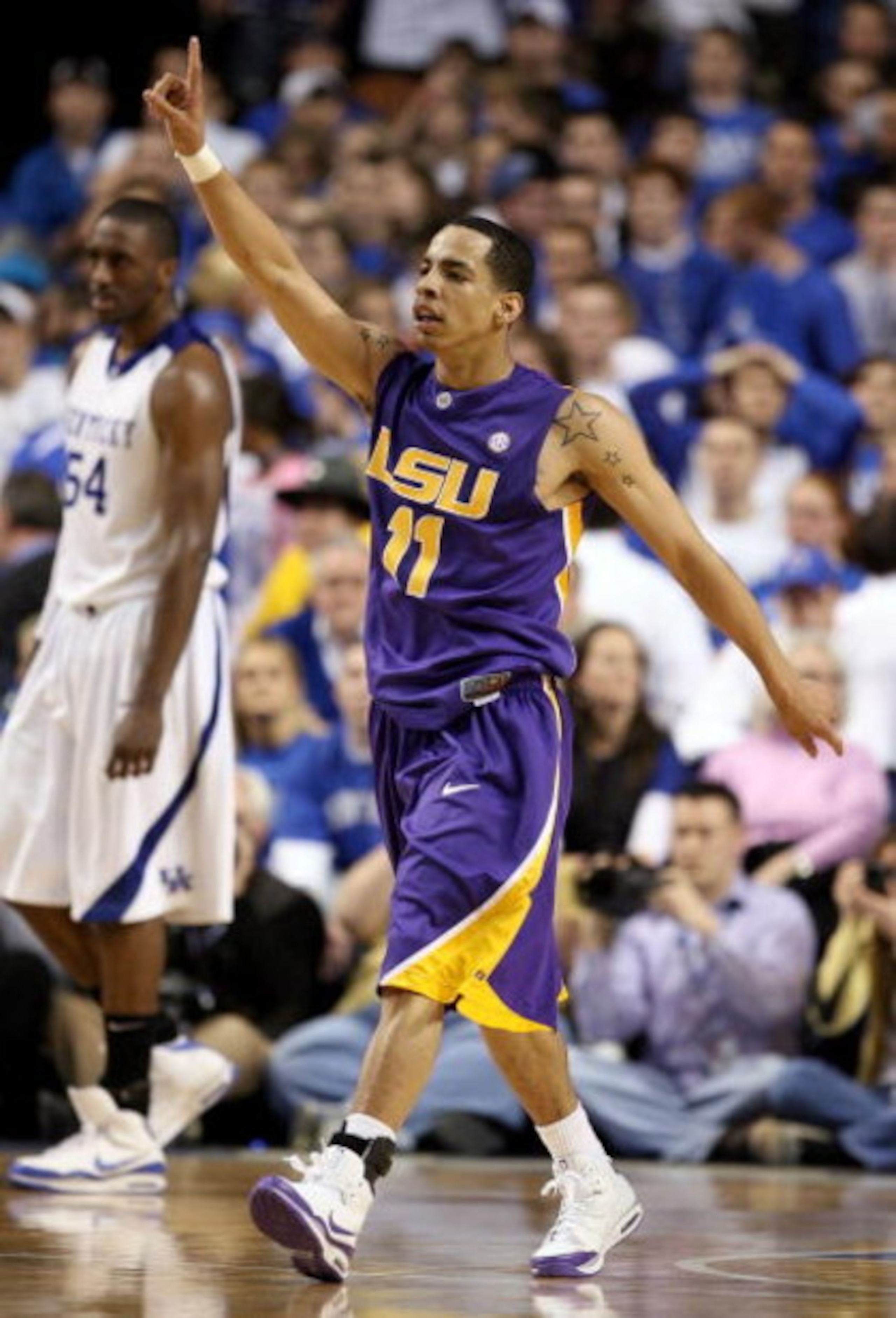 LEXINGTON, KY - FEBRUARY 28: Tasmin Mitchell #11 of the LSU Tigers celebrate the Tigers 73-70 victory over the Kentucky Wildcats during the SEC game at Rupp Arena on February 28, 2009 in Lexington, Kentucky.  (Photo by Andy Lyons/Getty Images)