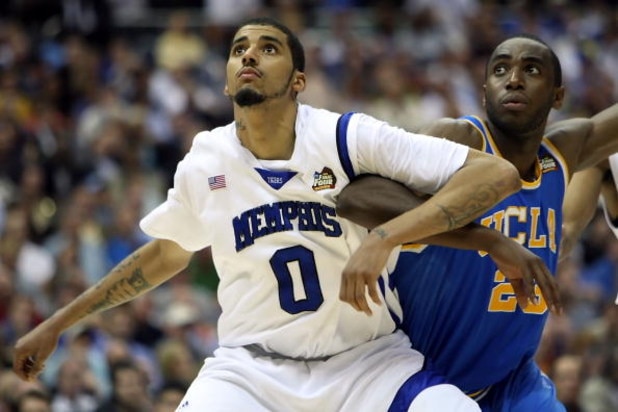 SAN ANTONIO - APRIL 05:  Shawn Taggart #0 of the Memphis Tigers boxes out Luc Richard Mbah a Moute #23 of the UCLA Bruins during the National Semifinal game of the NCAA Men's Final Four at the Alamodome on April 5, 2008 in San Antonio, Texas.  (Photo by J