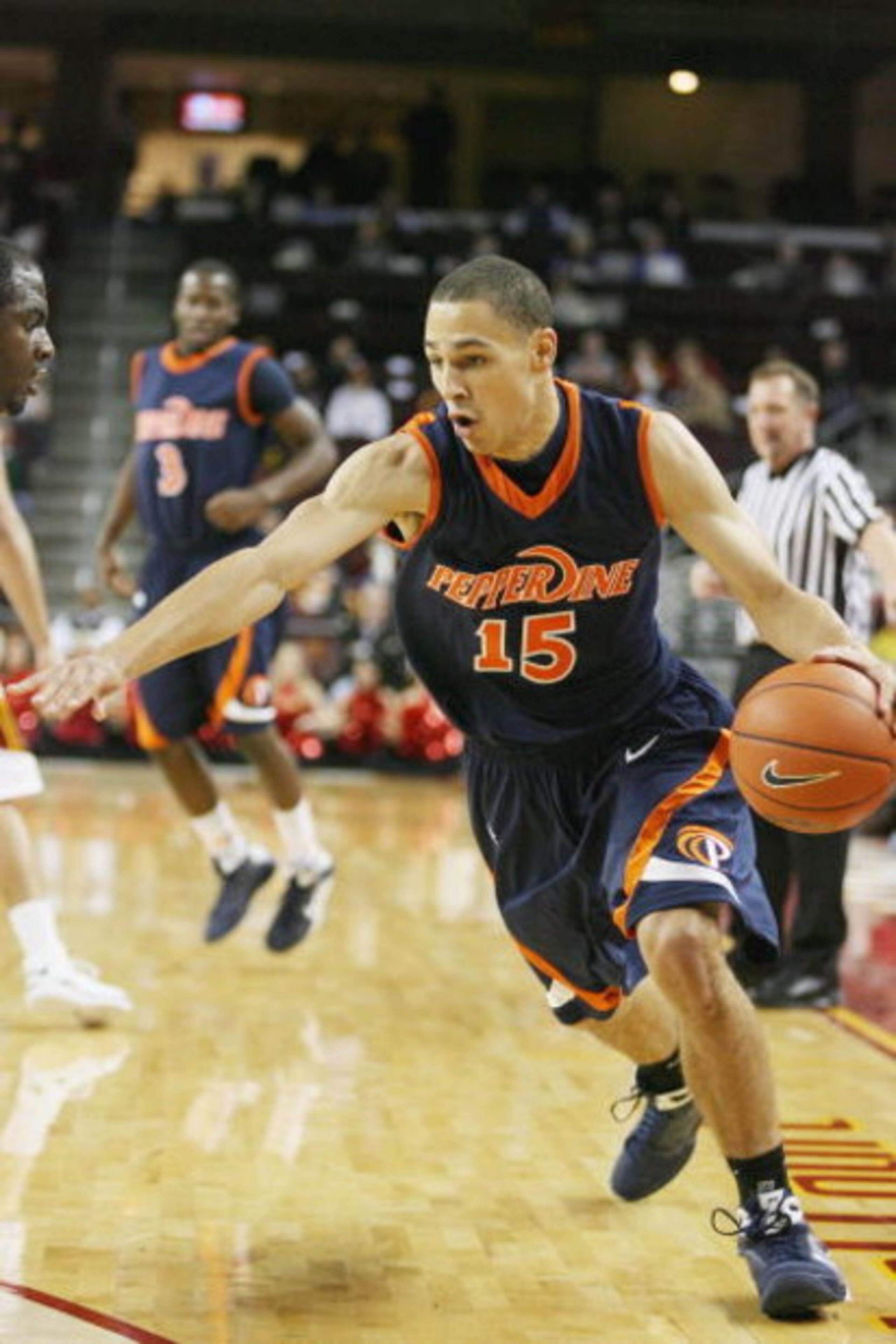 LOS ANGELES - DECEMBER 15:  Mychel Thompson #15 of the Pepperdine Waves drives against the USC Trojans in the second half on December 15, 2008 at the Galen Center in Los Angeles, California.  USC won 91-77.  (Photo by Jeff Golden/Getty Images)