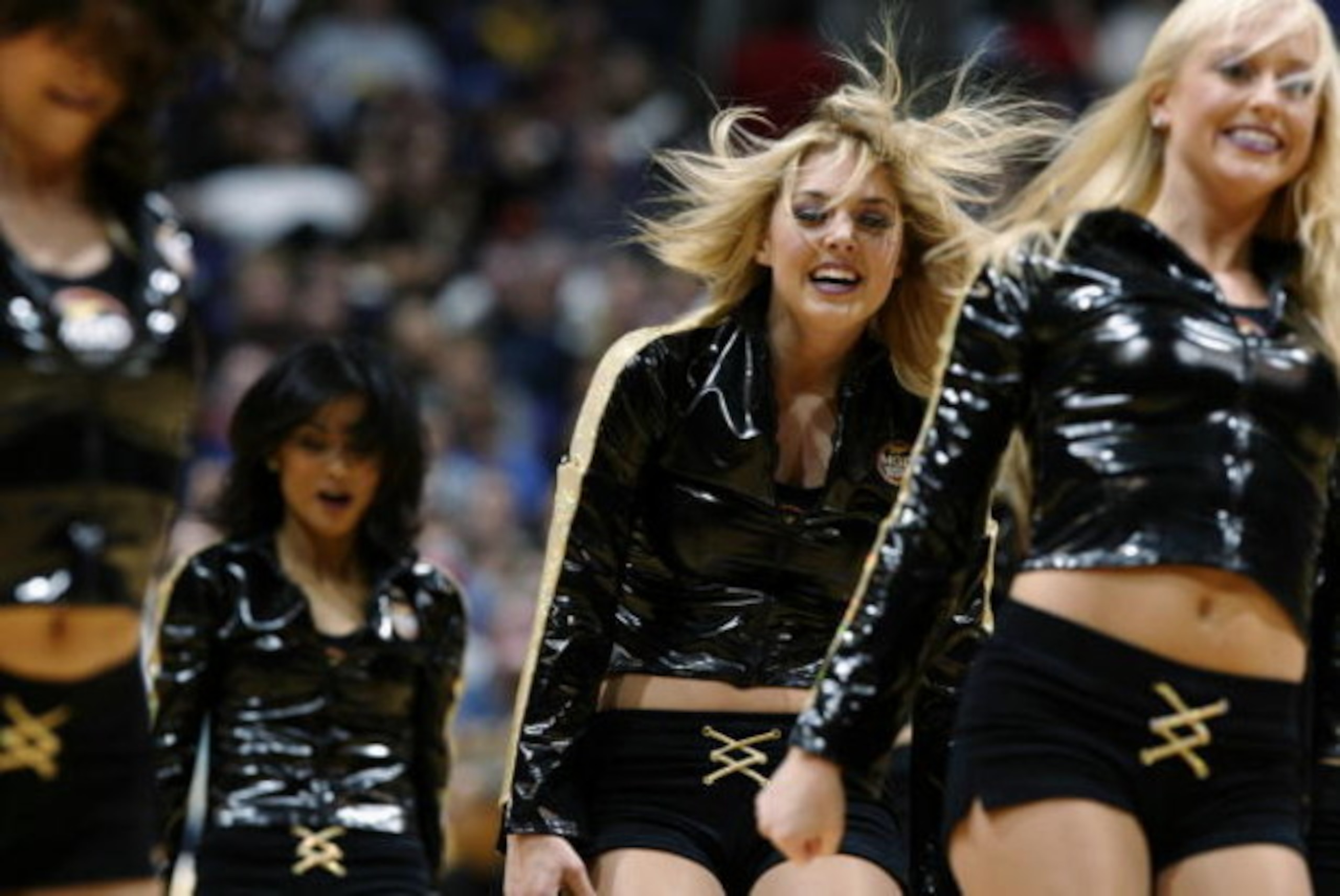LOS ANGELES - DECEMBER 3: The Los Angeles Lakers cheerleaders perform during a break from the game against the Memphis Grizzlies at Staples Center on December 3, 2002 in Los Angeles, California. The Lakers won 101-91. NOTE TO USER: User expressly ackno LOS ANGELES - DECEMBER 3: The Los Angeles Lakers cheerleaders perform during a break from the game against the Memphis Grizzlies at Staples Center on December 3, 2002 in Los Angeles, California. The Lakers won 101-91. NOTE TO USER: User expressly ackno