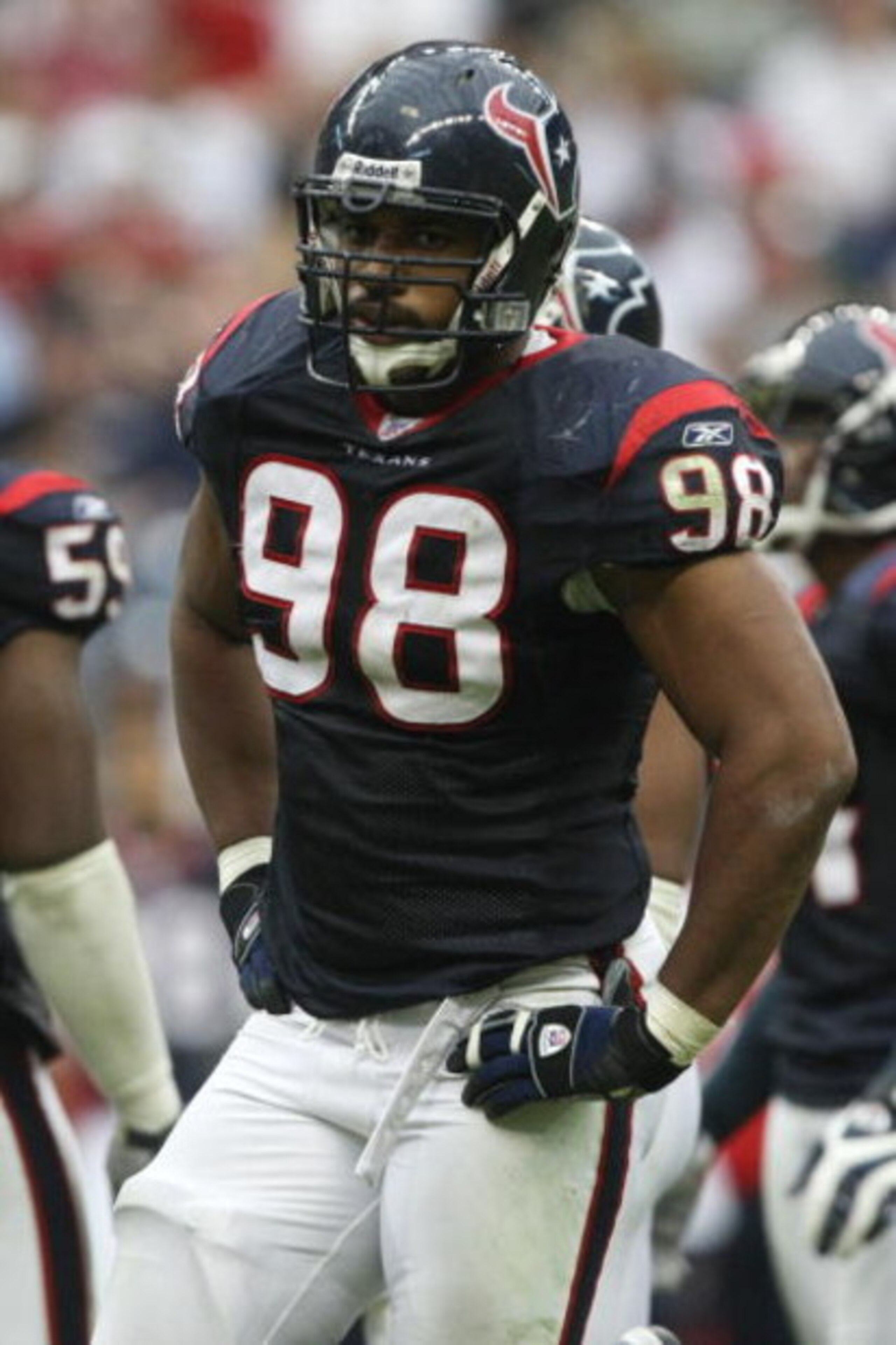 HOUSTON - NOVEMBER 18:  Anthony Weaver #98 of the Houston Texans looks on during the NFL game against the New Orleans Saints at Camp Reliant Stadium on November 18, 2007 in Houston, Texas. (Photo by Stephen Dunn/Getty Images)