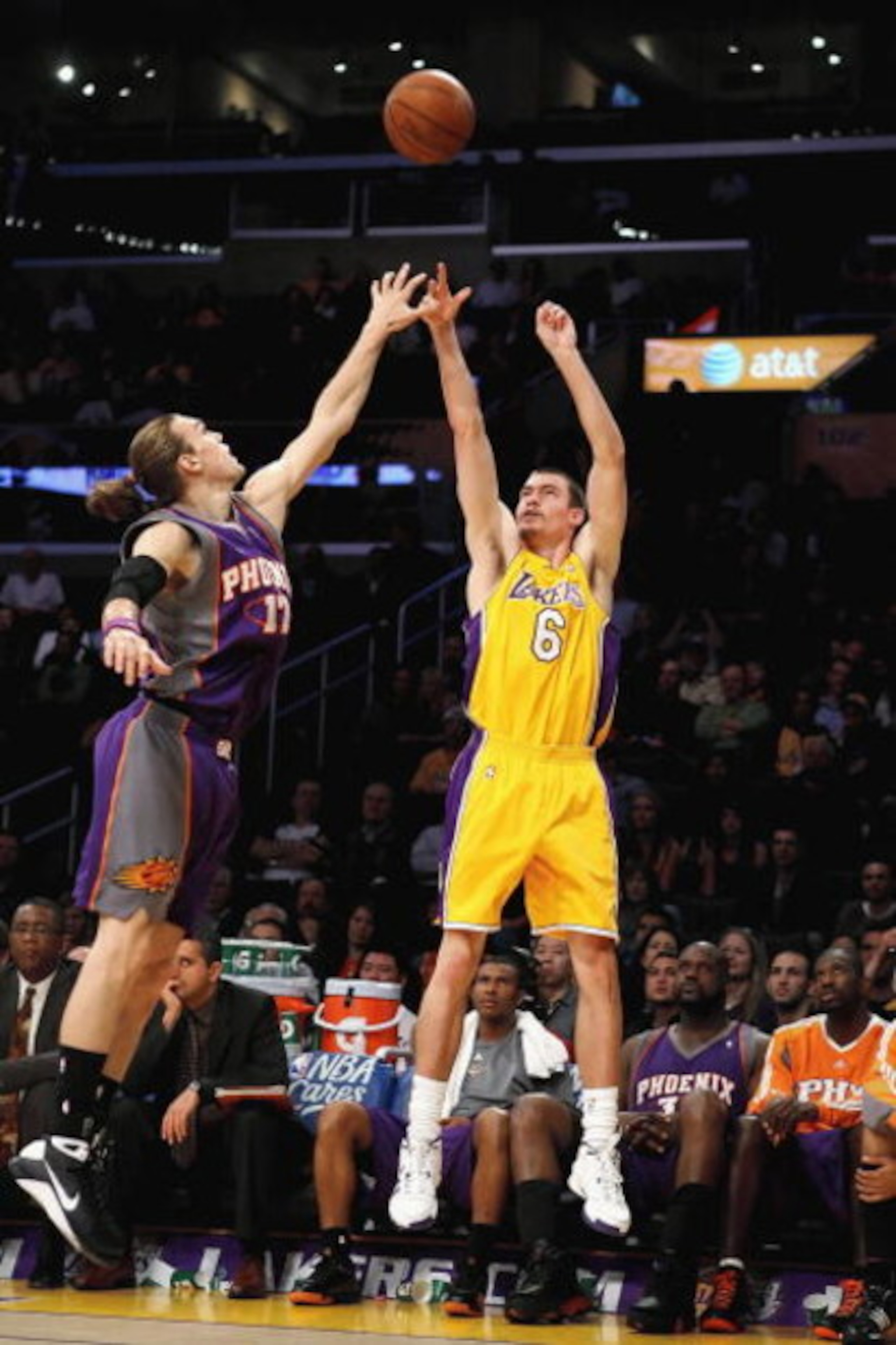 LOS ANGELES, CA - FEBRUARY 26: Adam Morrison #6 of the Los Angeles Lakers shoots a three point shot over Louis Amundson #17 of the Phoenix Suns during the NBA game at Staples Center on February 26, 2009 in Los Angeles, California. The Lakers defeated t LOS ANGELES, CA - FEBRUARY 26: Adam Morrison #6 of the Los Angeles Lakers shoots a three point shot over Louis Amundson #17 of the Phoenix Suns during the NBA game at Staples Center on February 26, 2009 in Los Angeles, California. The Lakers defeated t