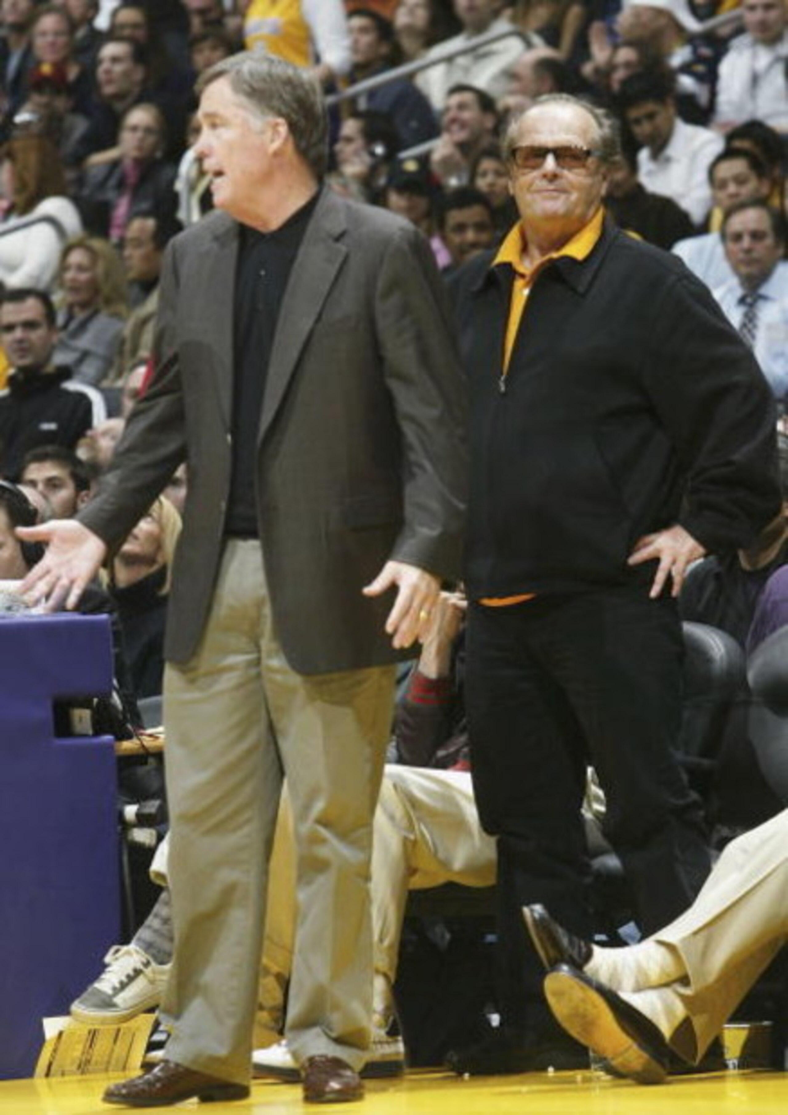 LOS ANGELES - JANUARY 27: Actor and Laker fan Jack Nicholson smiles as head coach Mike Montgomery of the Golden State Warriors complains to the referees in the game with the Los Angeles Lakers on January 27, 2006 at Staples Center in Los Angeles, Califor LOS ANGELES - JANUARY 27: Actor and Laker fan Jack Nicholson smiles as head coach Mike Montgomery of the Golden State Warriors complains to the referees in the game with the Los Angeles Lakers on January 27, 2006 at Staples Center in Los Angeles, Califor