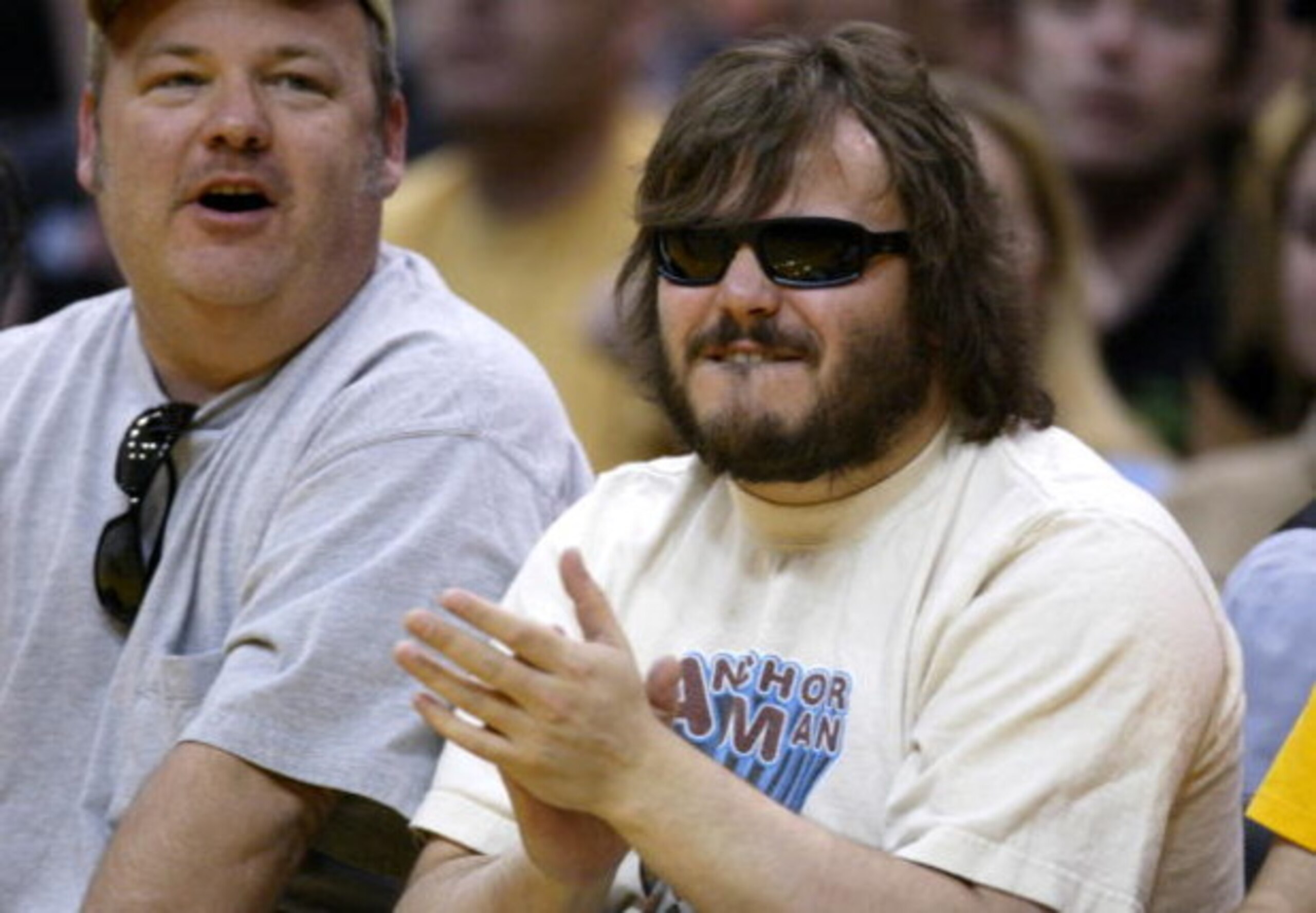 LOS ANGELES - APRIL 4: Actor Jack Black (R) and musician Kyle Gass cheers as they attend the game between the Los Angeles Lakers and the San Antonio Spurs at Staples Center on April 4, 2004 in Los Angeles, California. NOTICE TO USER: User expressly ackno LOS ANGELES - APRIL 4: Actor Jack Black (R) and musician Kyle Gass cheers as they attend the game between the Los Angeles Lakers and the San Antonio Spurs at Staples Center on April 4, 2004 in Los Angeles, California. NOTICE TO USER: User expressly ackno