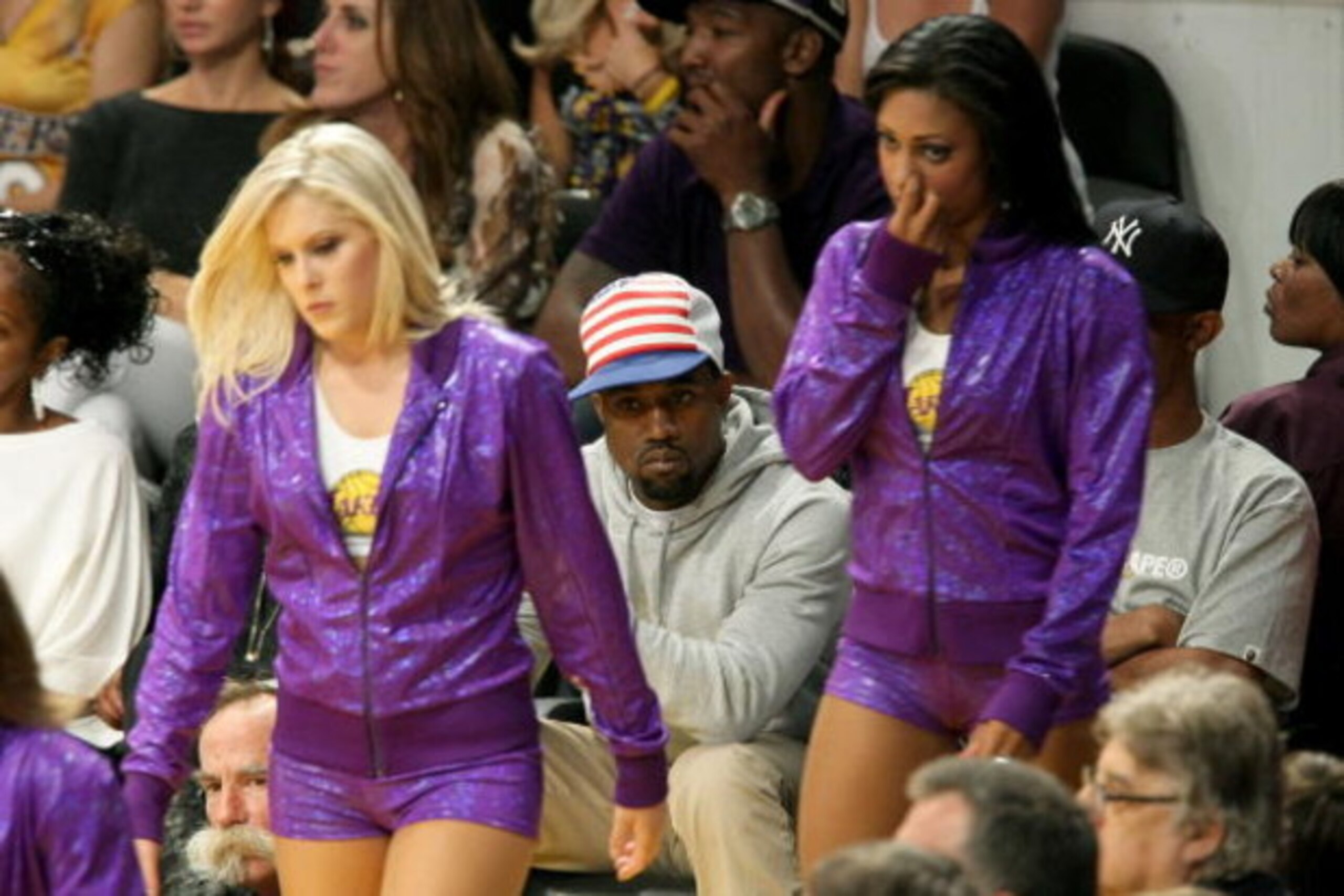 LOS ANGELES, CA - JUNE 10: The Laker Girls walk in front of rapper Kanye West in Game Three of the 2008 NBA Finals between the Boston Celtics and the Los Angeles Lakers on June 10, 2008 at Staples Center in Los Angeles, California. NOTE TO USER: User ex LOS ANGELES, CA - JUNE 10: The Laker Girls walk in front of rapper Kanye West in Game Three of the 2008 NBA Finals between the Boston Celtics and the Los Angeles Lakers on June 10, 2008 at Staples Center in Los Angeles, California. NOTE TO USER: User ex