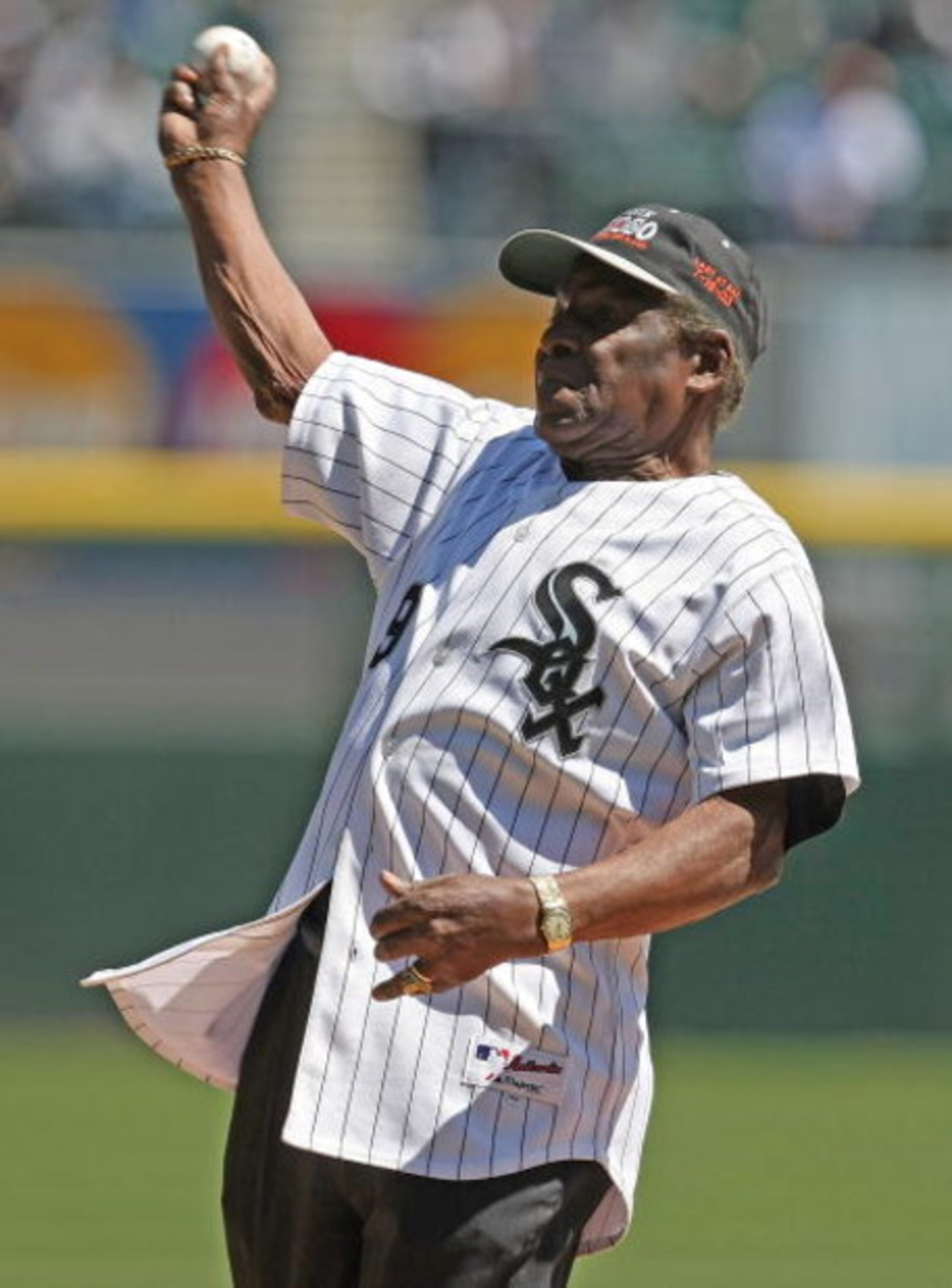 CHICAGO - APRIL 15: Former Chicago White Sox player Minnie Minoso throws out a ceremonial first pitch honoring Jackie Robinson before a game between the White Six and the Oakland Athletics on April 15, 2008 at U.S. Cellular Field in Chicago, Illinois. The