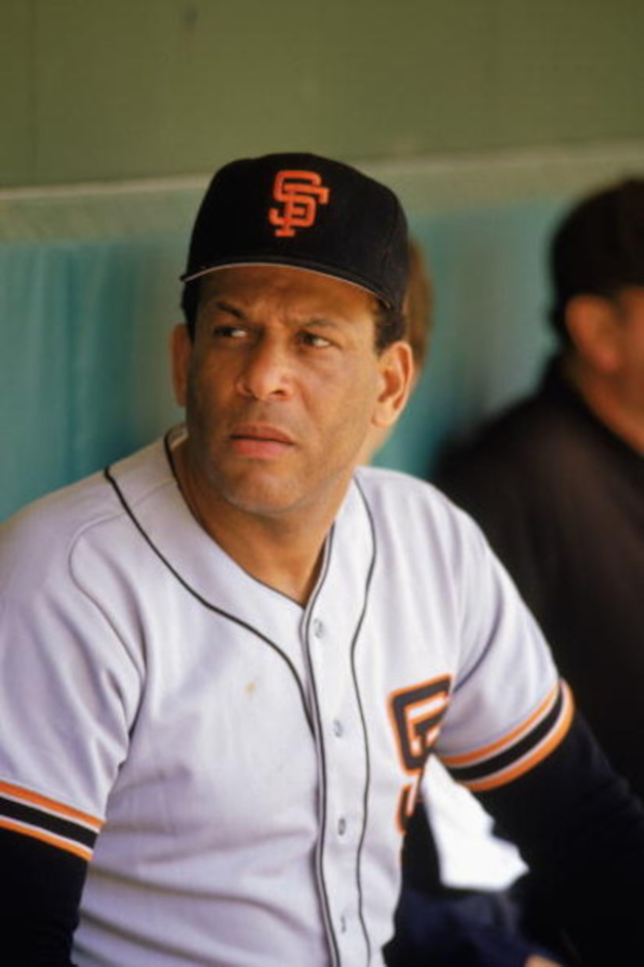 1986:  Former San Francisco Giant player Orlando Cepeda '58-'66, looks on from the dugout during the 1986 season. (Photo by: Stephen Dunn/Getty Images)