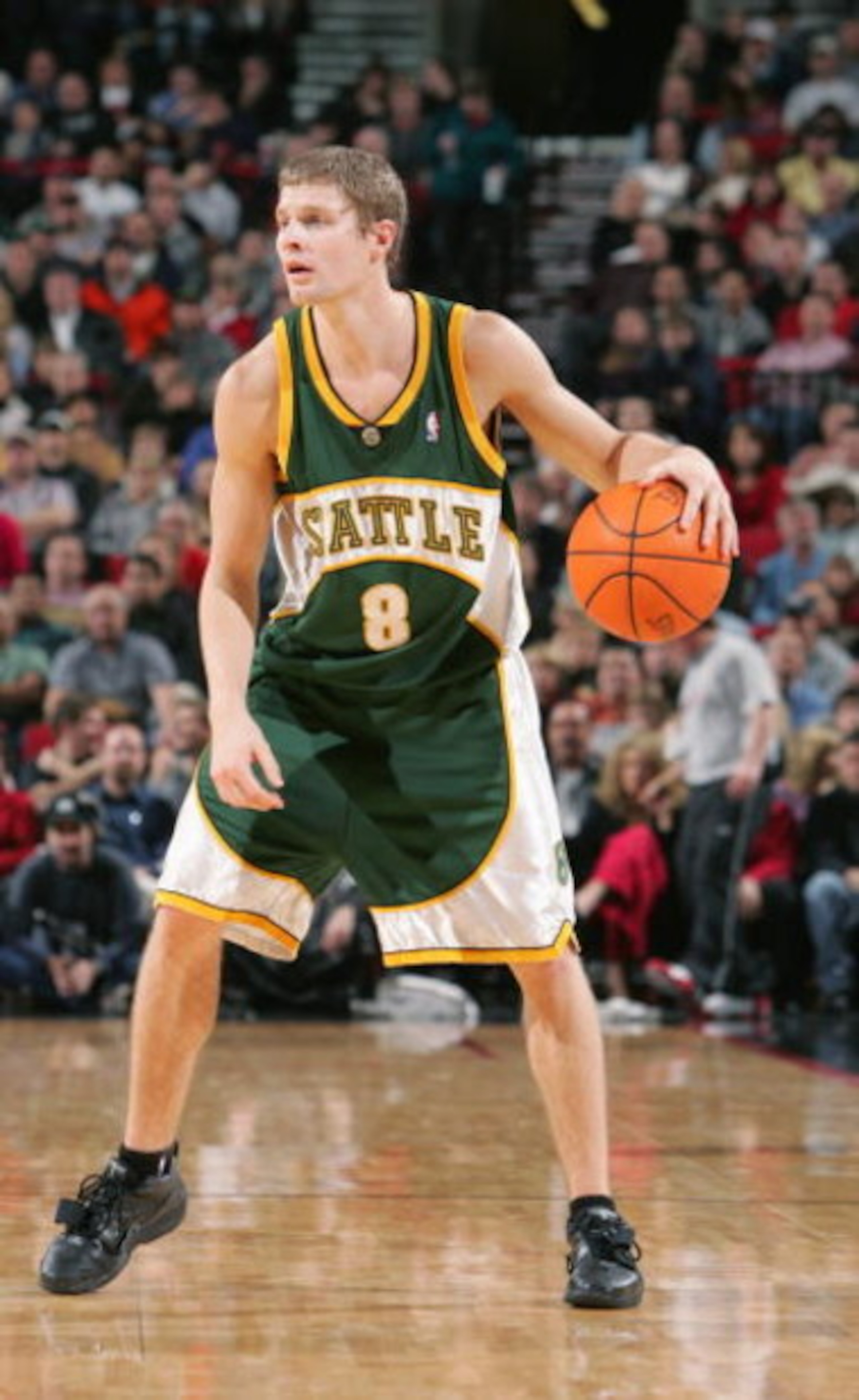 PORTLAND - NOVEMBER 30:  Luke Ridnour #8 on the Seattle Sonics moves the bal against the Portland Trail Blazers during a game on November 30, 2004 at the Rose Garden Arena in Portland, Oregon. The Blazers won 100-94. NOTE TO USER: User expressly acknowled