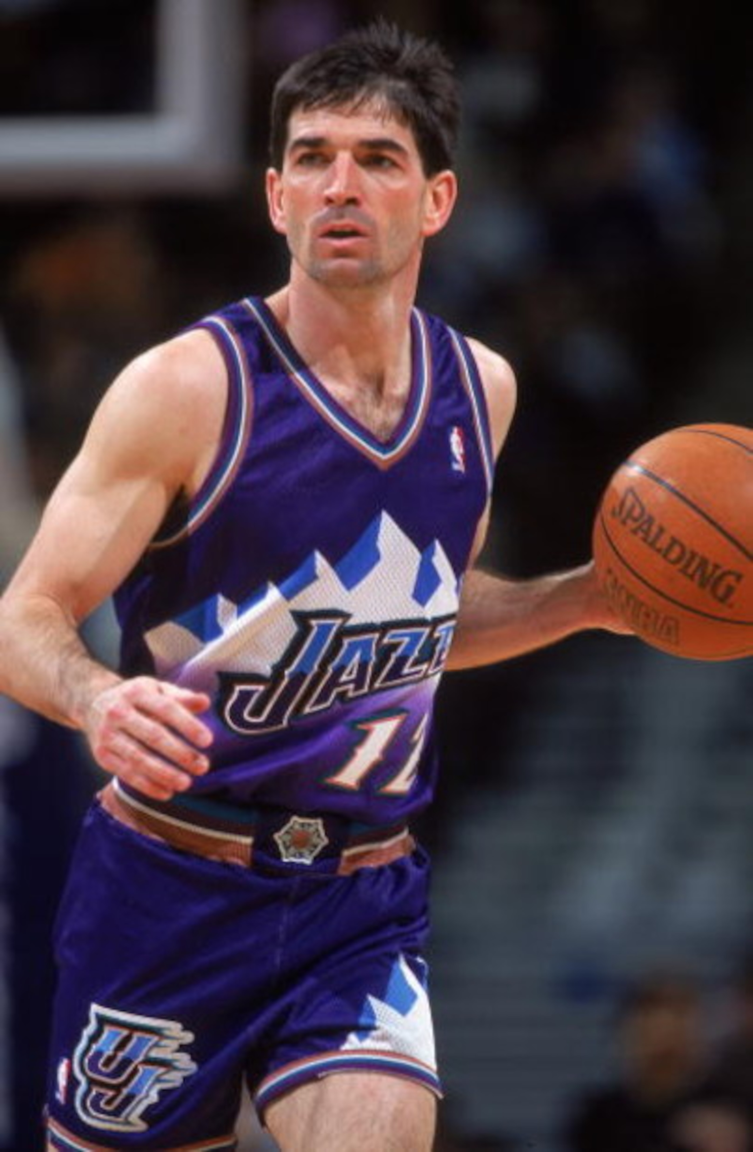 1 Apr 2000:  John Stockton #12 of the Utah Jazz dribbles the ball down court during a game against the Denver Nuggets at the Pepsi Center in Denver Colorado. The Nuggets defeated the Jazz 112-92.     Mandatory Credit: Brian Bahr  /Allsport
