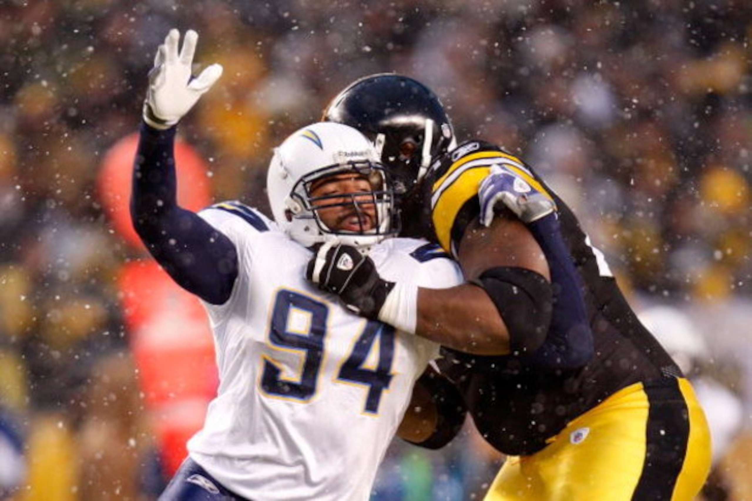 PITTSBURGH - JANUARY 11:  Jyles Tucker #94 of the San Diego Chargers rushes the passer against the Pittsburgh Steelers during their AFC Divisional Playoff Game on January 11, 2009 at Heinz Field in Pittsburgh, Pennsylvania.  (Photo by Gregory Shamus/Getty