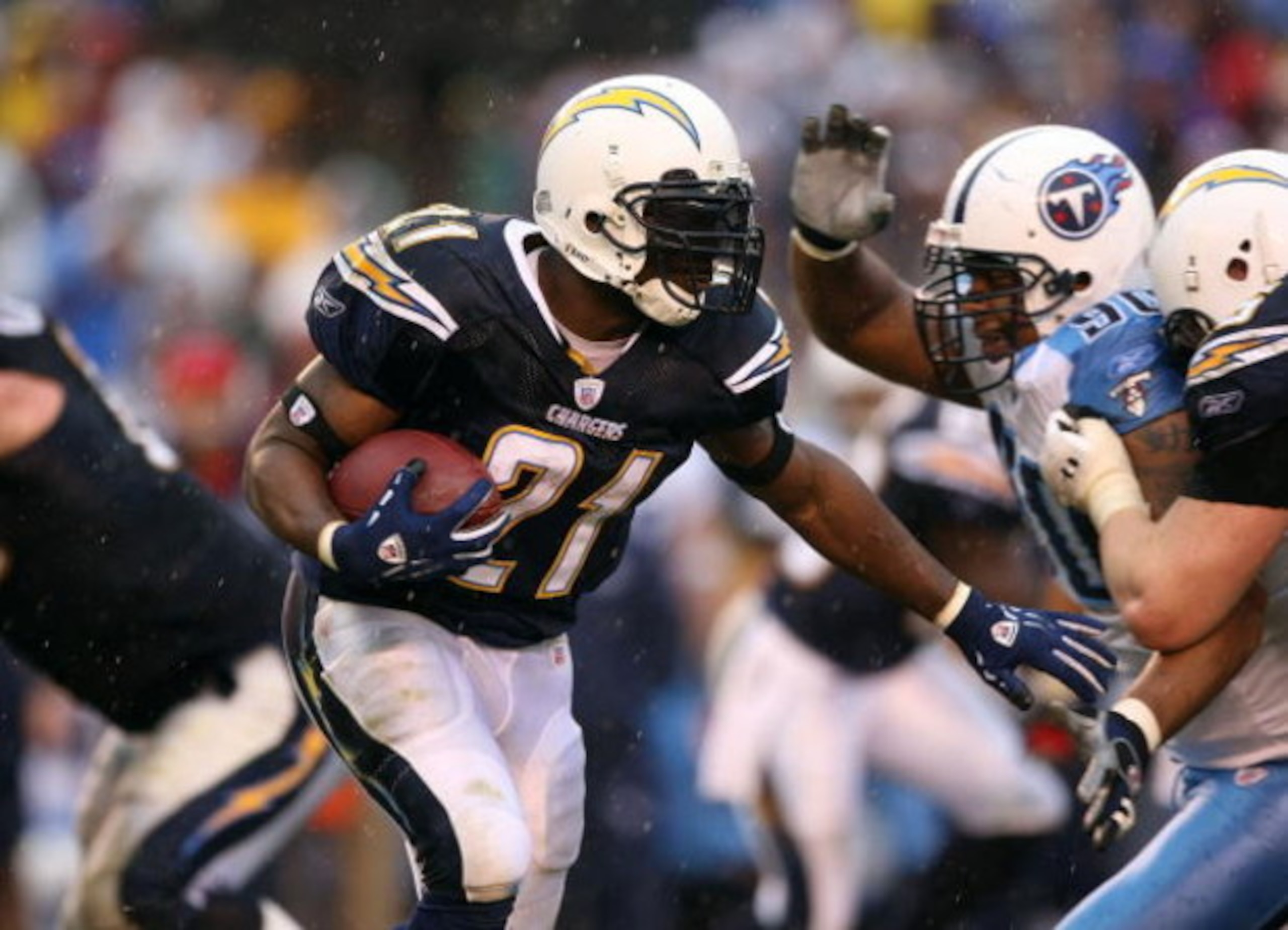 SAN DIEGO - JANUARY 06:  LaDanian Tomlinson #21 of the San Diego Chargers runs for yardage against  the Tennessee Titans in the second half during their AFC Wild Card Playoff Game at Qualcomm Stadium on January 6, 2008 in San Diego, California. The Charge