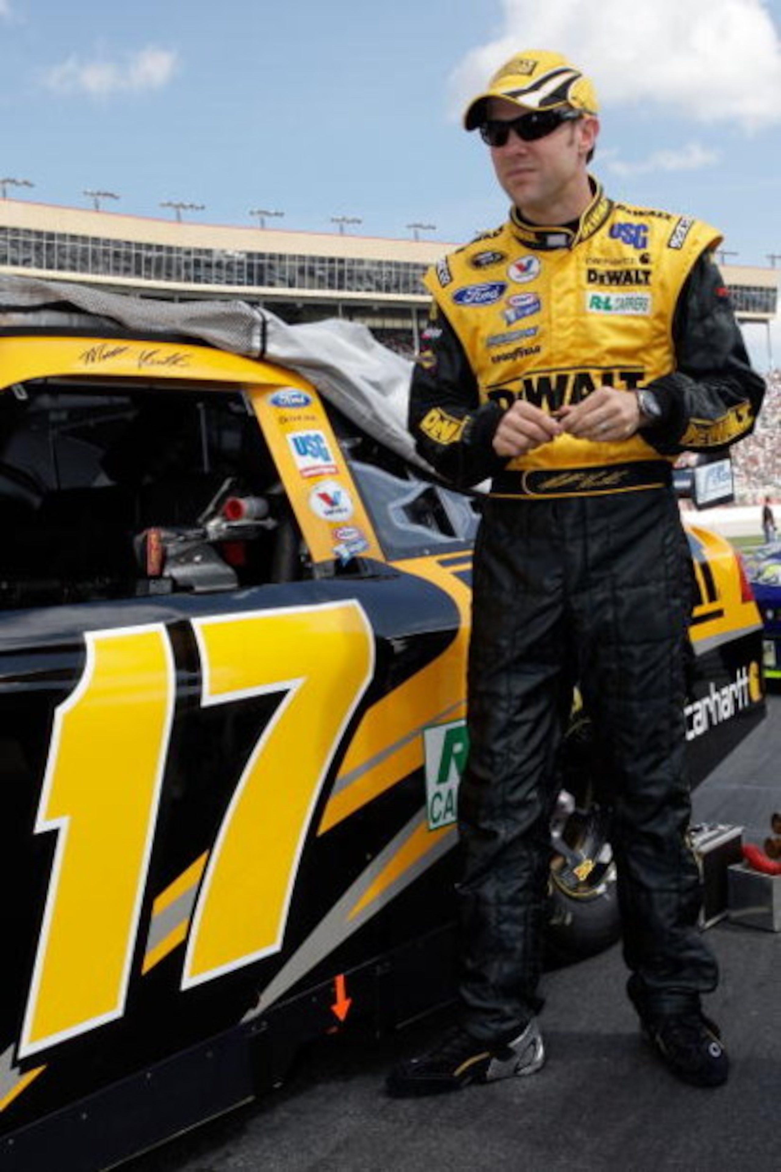 HAMPTON, GA - MARCH 08:  Matt Kenseth driver of the Dewalt Ford stands by his car before the start of the NASCAR Sprint Cup Series Kobalt Tools 500 at the Atlanta Motor Speedway on March 8, 2009 in Hampton, Georgia.  (Photo by John Harrelson/Getty Images)