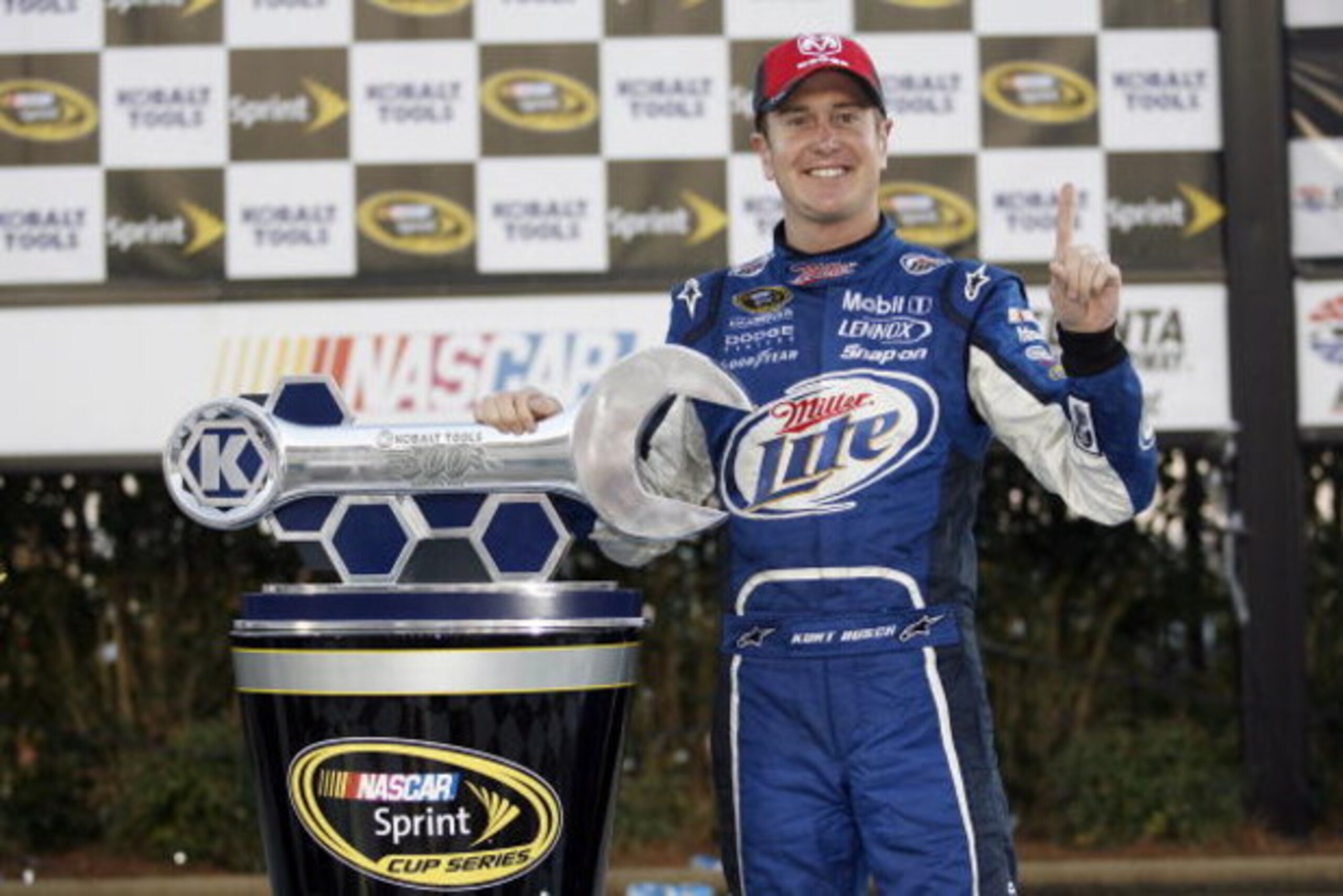 HAMPTON, GA - MARCH 08:  Kurt Busch, driver of the #2 Miller Lite Dodge, celebrates in victory lane after winning the NASCAR Sprint Cup Series Kobalt Tools 500 at the Atlanta Motor Speedway on March 8, 2009 in Hampton, Georgia.  (Photo by Geoff Burke/Gett