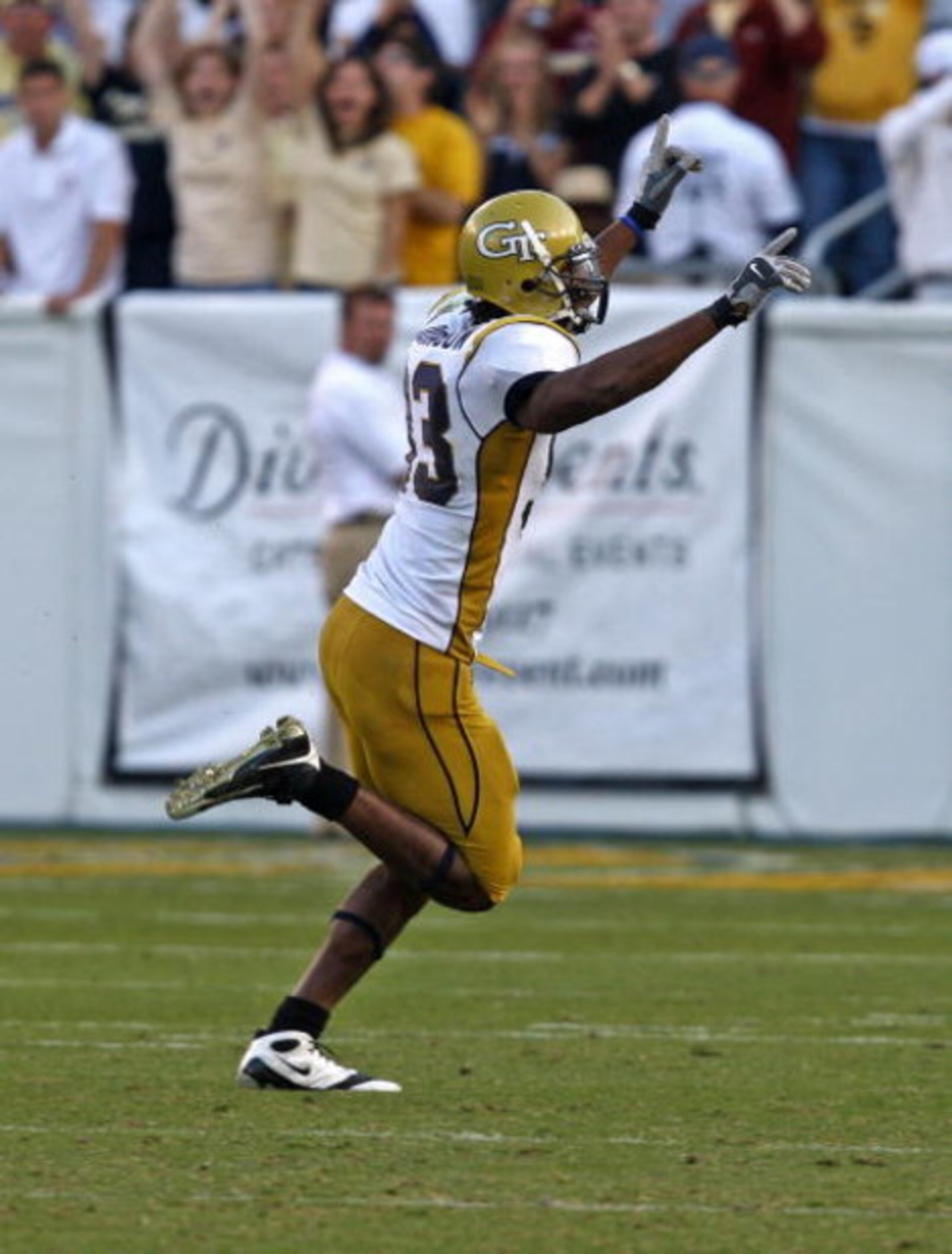 ATLANTA - NOVEMBER 1:  Defensive end Michael Johnson #93 of the Georgia Tech Yellow Jackets celebrates a forced fumble on the Florida State Seminoles quarterback during the game at Bobby Dodd Stadium at Historic Grant Field on November 1, 2008 in Atlanta,