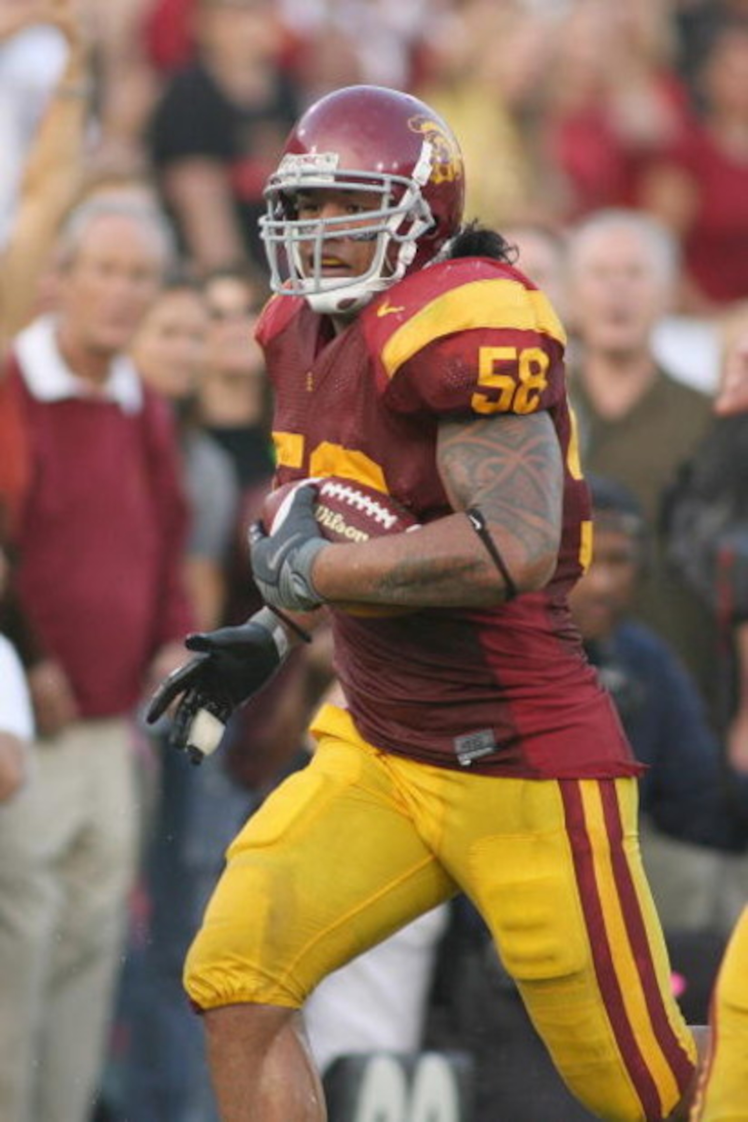 LOS ANGELES - SEPTEMBER 13:  Rey Maualuga #58 of the USC Trojans returns an interception 48 yards for a touchdown against the Ohio State Buckeyes in the second quarter on September 13, 2008 at the Los Angeles Memorial Coliseum in Los Angeles, California. 