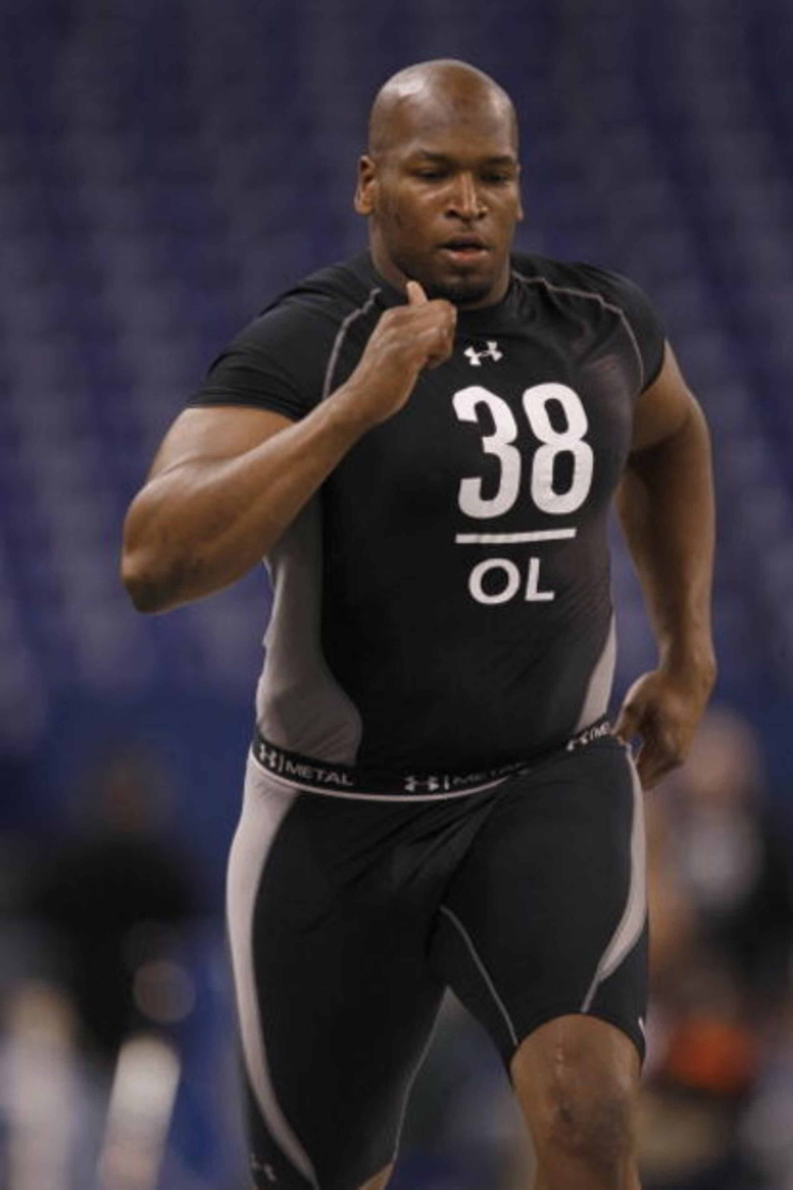 INDIANAPOLIS, IN - FEBRUARY 21:  Offensive lineman Eugene Monroe of Virginia runs the 40 yard dash during the NFL Scouting Combine presented by Under Armour at Lucas Oil Stadium on February 21, 2009 in Indianapolis, Indiana. (Photo by Scott Boehm/Getty Im