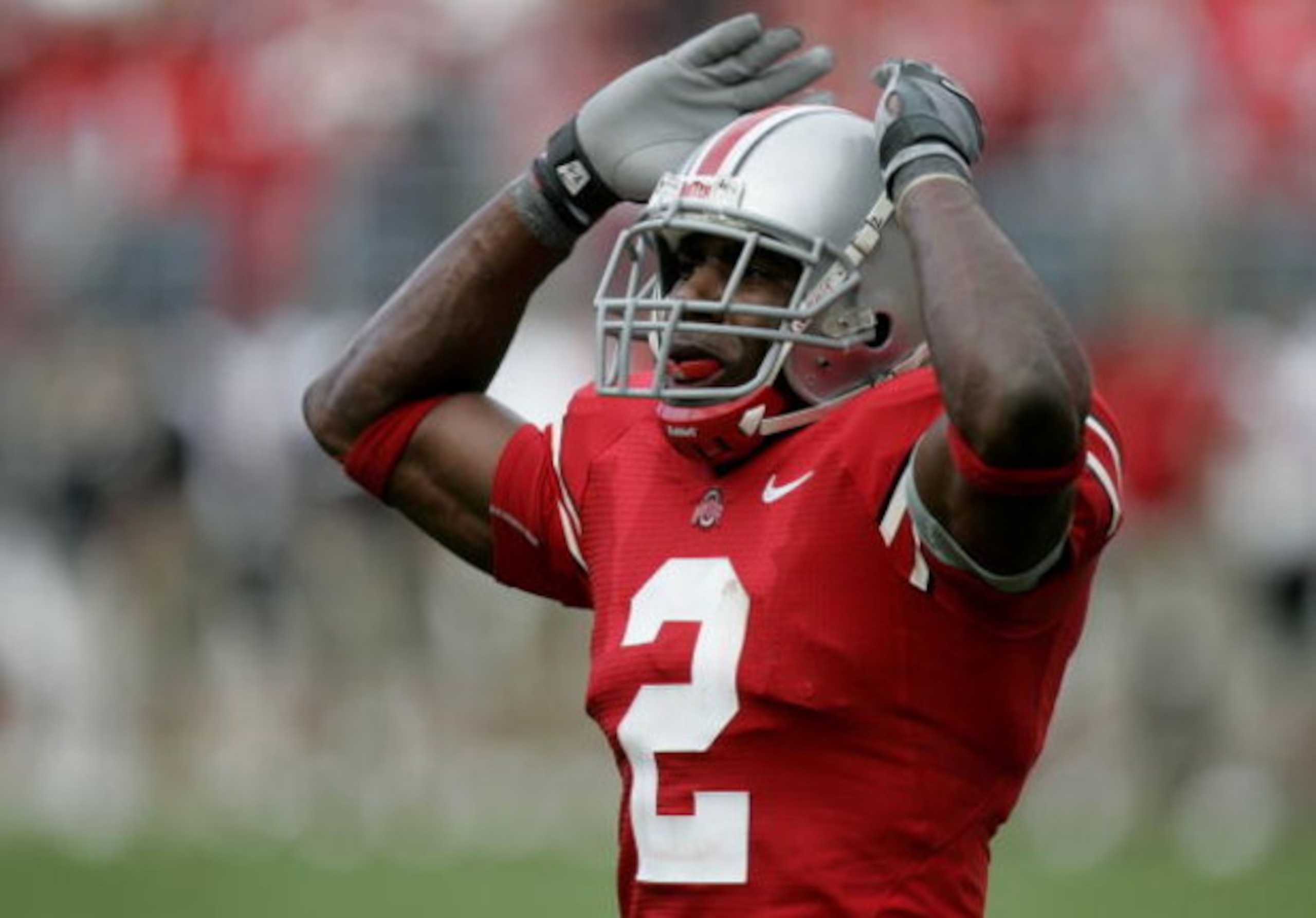 COLUMBUS, OH - SEPTEMBER 02:  Malcolm Jenkins #2 of the Ohio State Buckeyes tries to get the crowd noise up against the Northern Illinois Huskies on September 2, 2006 at Ohio Stadium in Columbus, Ohio. Ohio State won the game 35-12.  (Photo by Gregory Sha