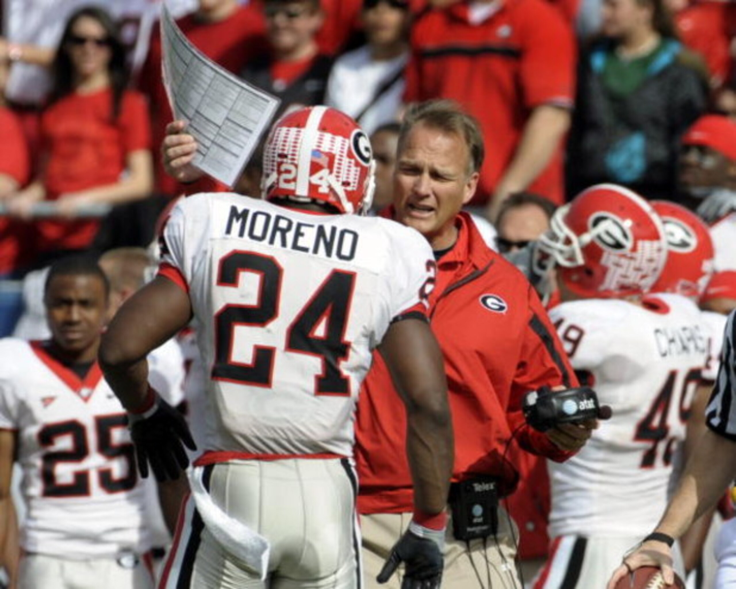 ORLANDO, FL - JANUARY 1: Running back Knowshon Moreno #24 of the University of Georgia talks with coach Mark Richt against the Michigan State Spartans during the 2009 Capital One Bowl at the Citrus Bowl on January 1, 2009 in Orlando, Florida.  (Photo by A