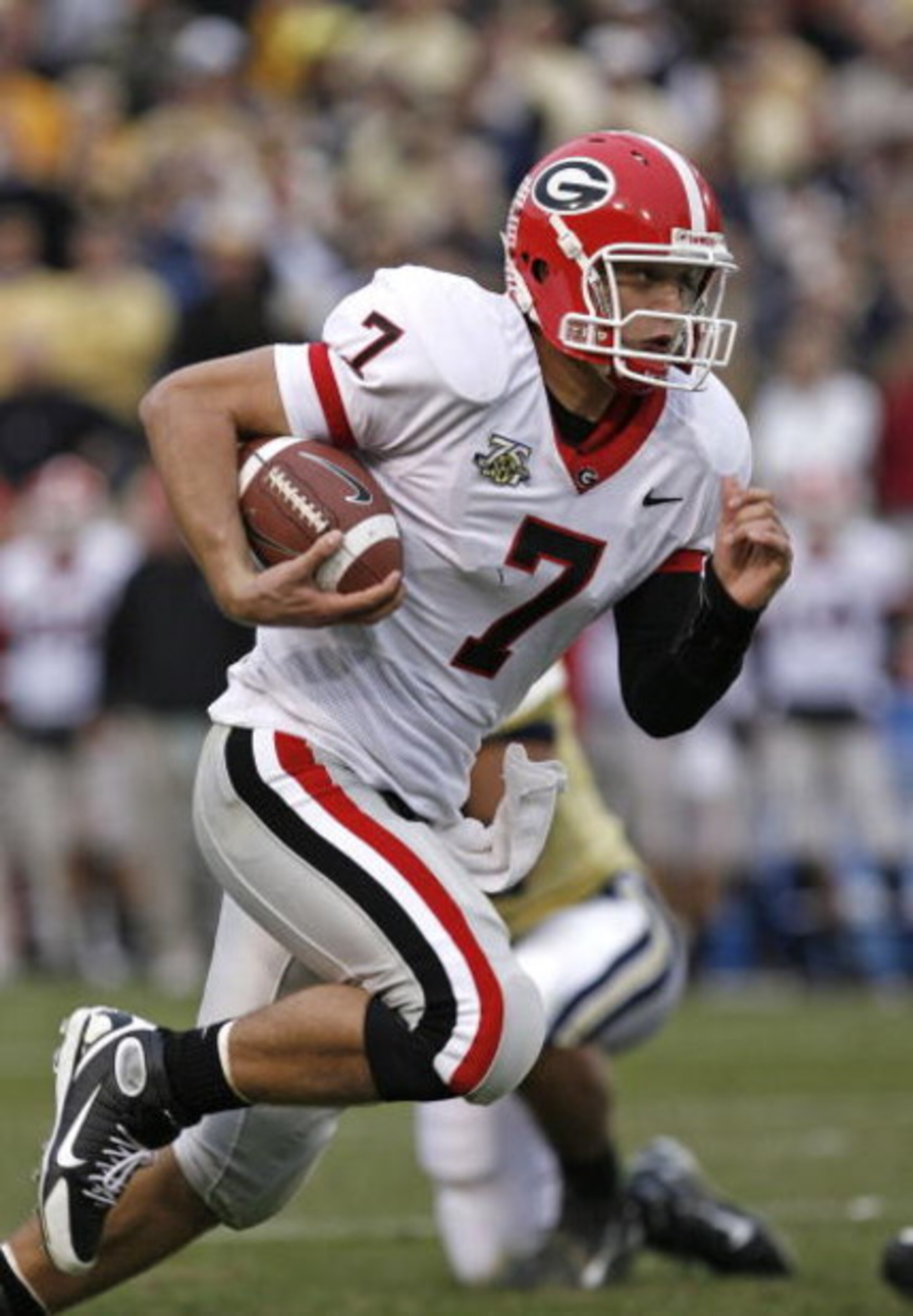 ATLANTA - NOVEMBER 24: Quarterback Matthew Stafford #7 of the Georgia Bulldogs rushes for a second quarter touchdown during the game against the Georgia Tech Yellow Jackets on November 24, 2007 at Bobby Dodd Stadium at Historic Grant Field in Atlanta, Geo