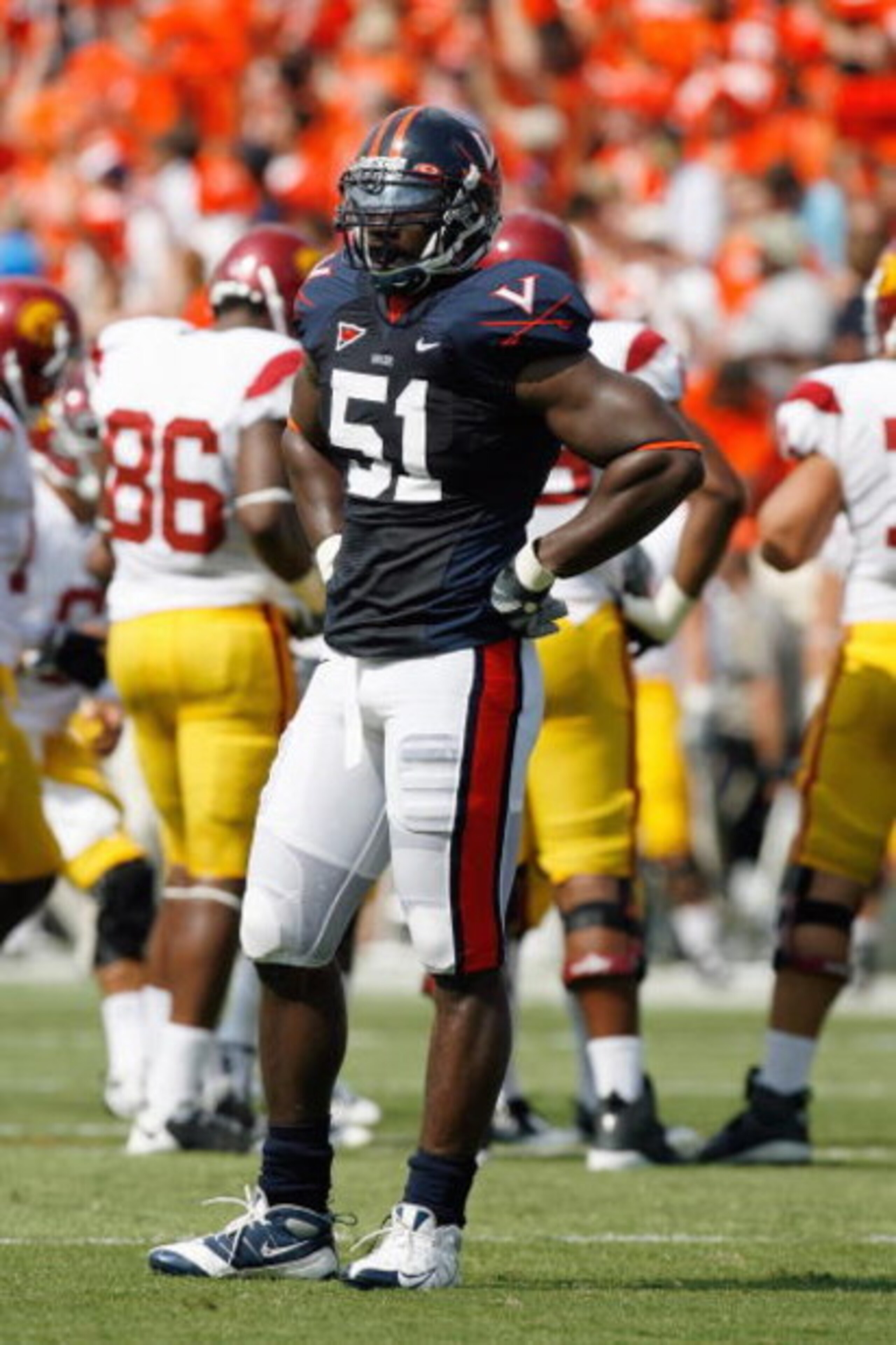 CHARLOTTESVILLE, VA - AUGUST 30:  Clint Sintim #51 of the Virginia Cavaliers waits on the field during the game against the Southern California Trojans at Scott Stadium on August 30, 2008 in Charlottesville, Virginia.  (Photo by Kevin C. Cox/Getty Images)
