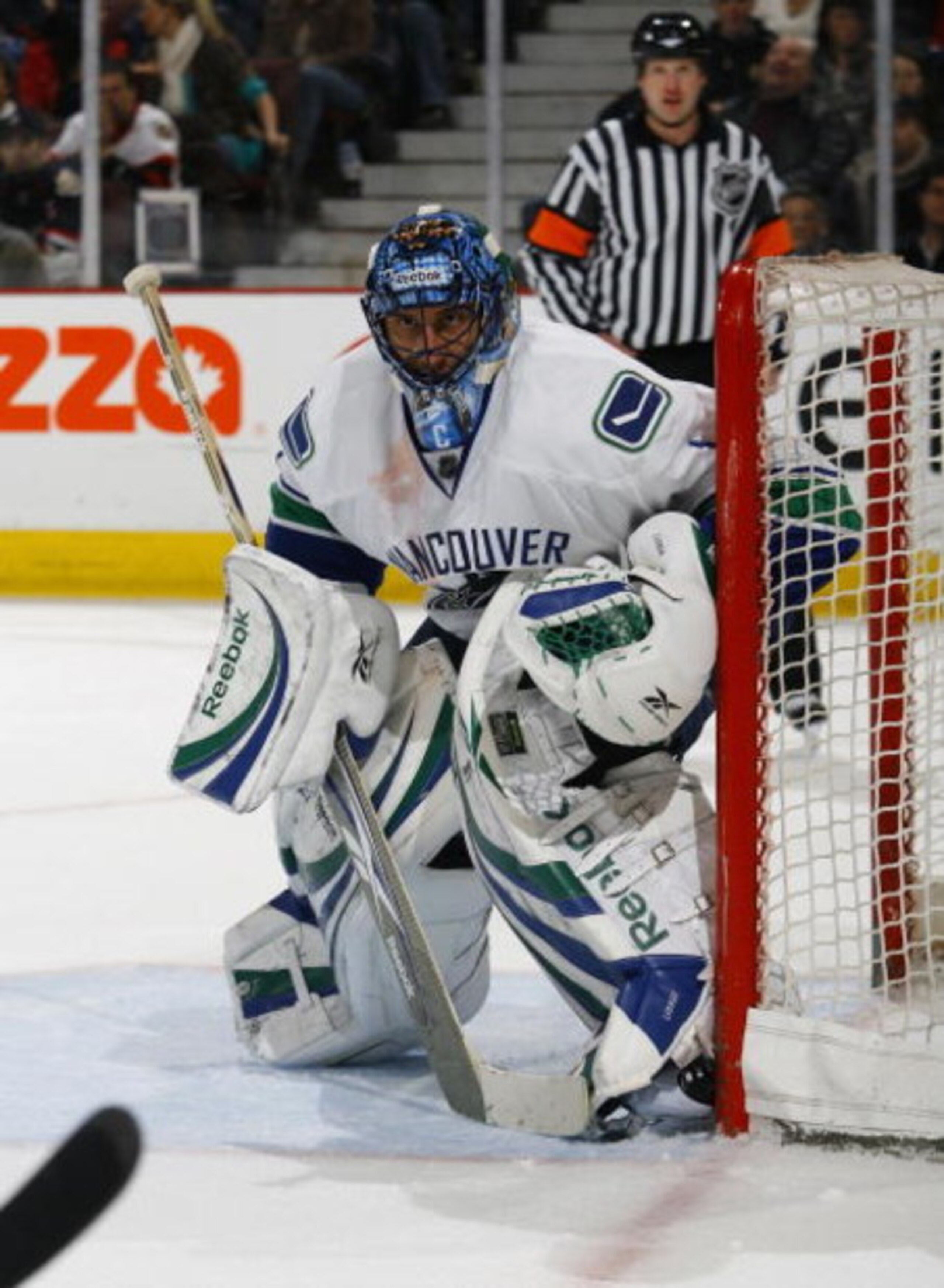 OTTAWA - FEBRUARY 19:  Roberto Luongo #1 of the Vancouver Canucks defends the net against the Ottawa Senators in a game on February 19, 2009 at the Scotiabank Place in Ottawa, Canada.  The Vancouver Canucks defeated the Ottawa Senators 5-2.  (Photo by Phi