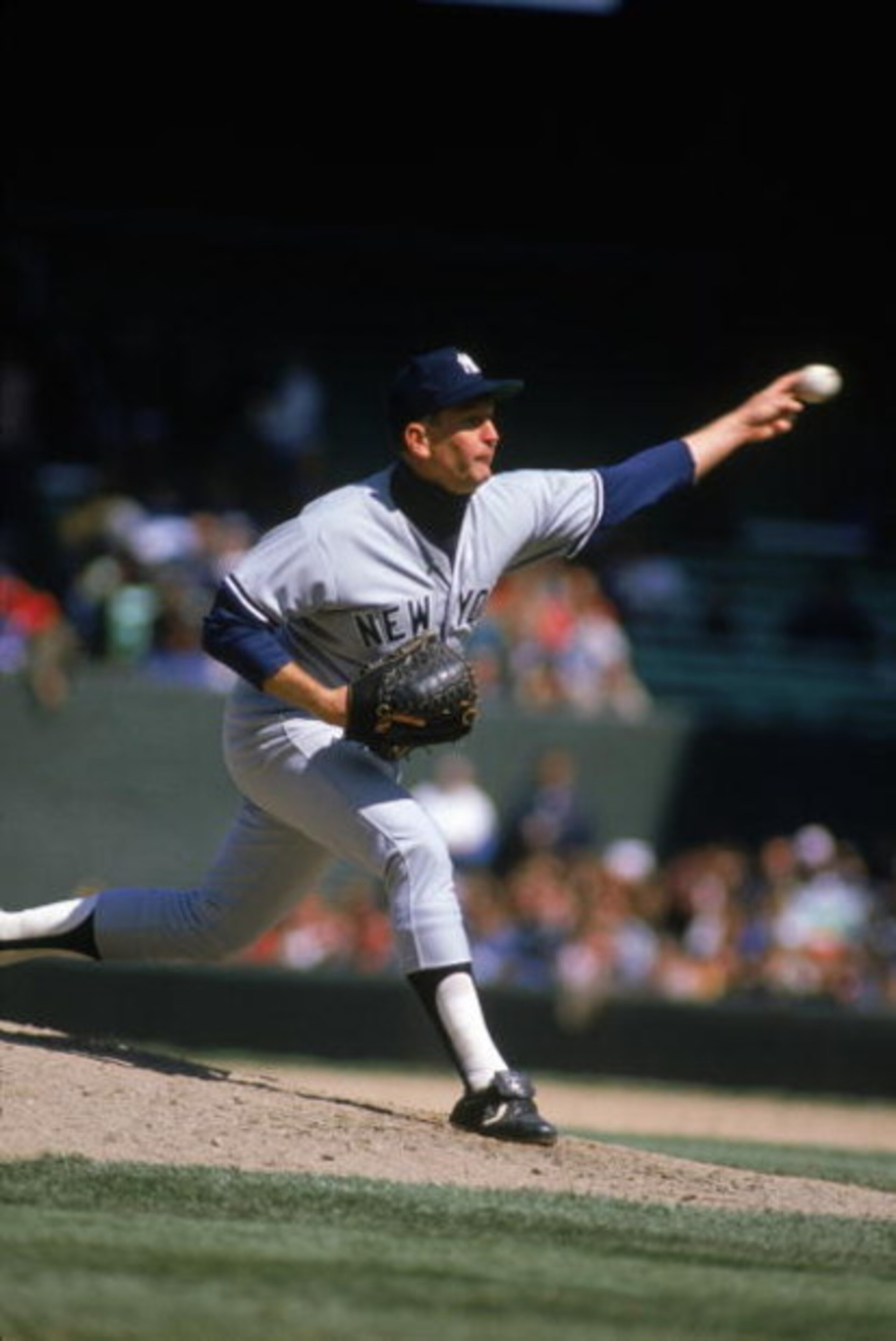 CHICAGO - 1989: Tommy John #25 of the New York Yankees pitches during a 1989 season game against the White Sox at Comiskey Park in Chicago Illinois. (Photo by Jonathan Daniel/Getty Images) CHICAGO - 1989: Tommy John #25 of the New York Yankees pitches during a 1989 season game against the White Sox at Comiskey Park in Chicago Illinois. (Photo by Jonathan Daniel/Getty Images)