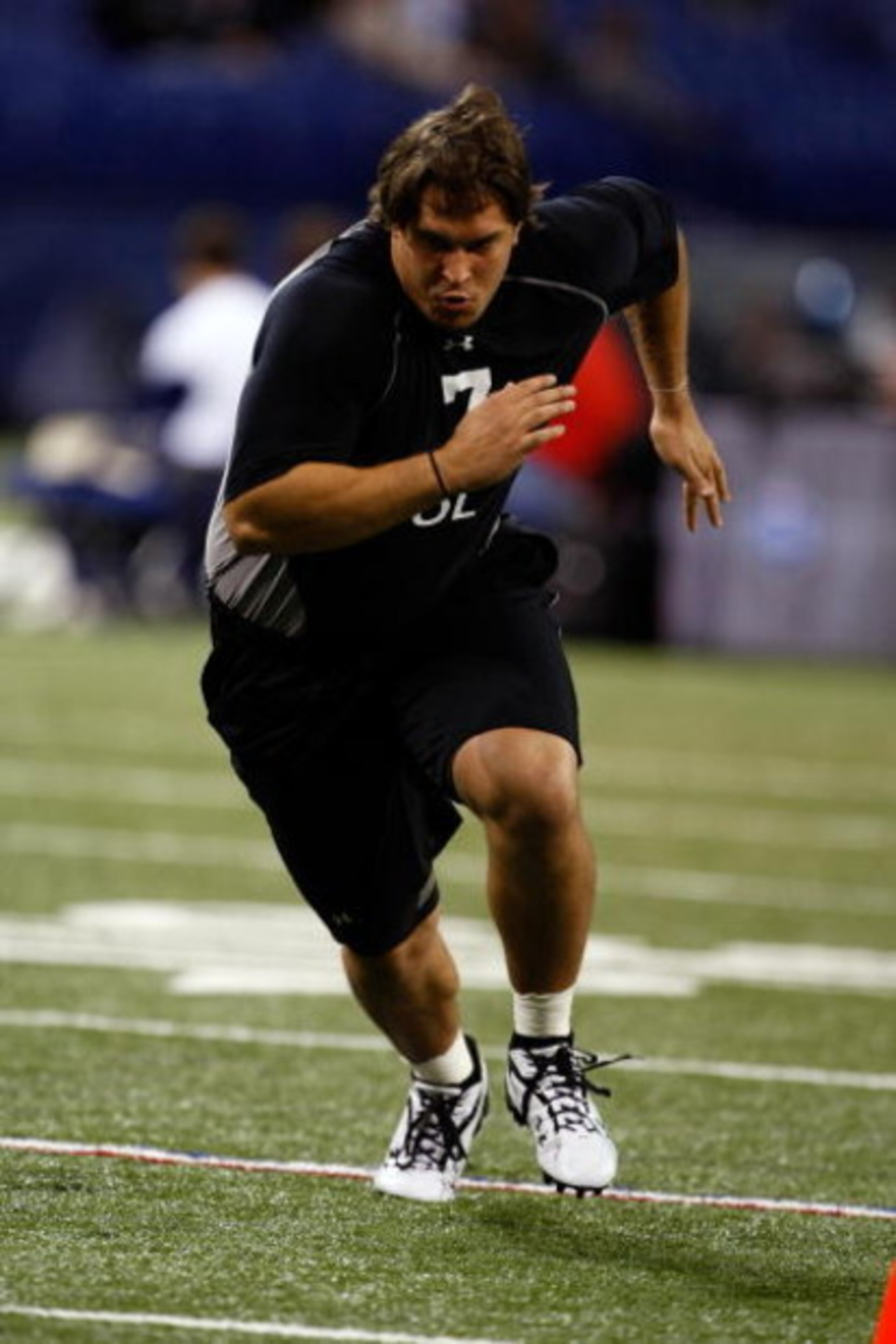 INDIANAPOLIS, IN - FEBRUARY 21:  Offensive lineman Eben Britton of Arizona runs as he participates in practice drills during the NFL Scouting Combine presented by Under Armour at Lucas Oil Stadium on February 21, 2009 in Indianapolis, Indiana. (Photo by S